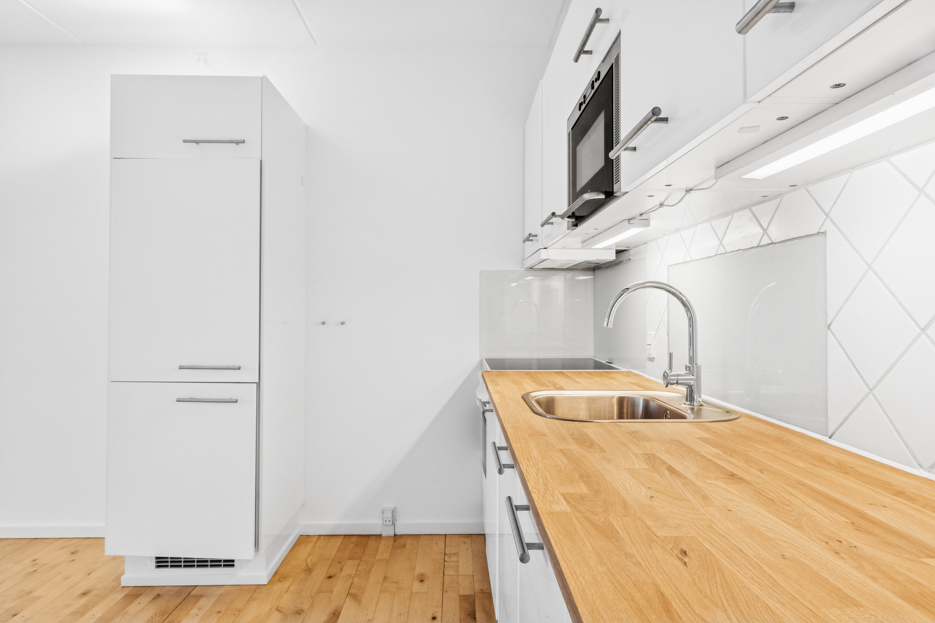 Fremhævet køkken billede i fuldskærmstilstand. Billede af Vejlegårdsparken 52, st.. 2., 2665 Vallensbæk Strand