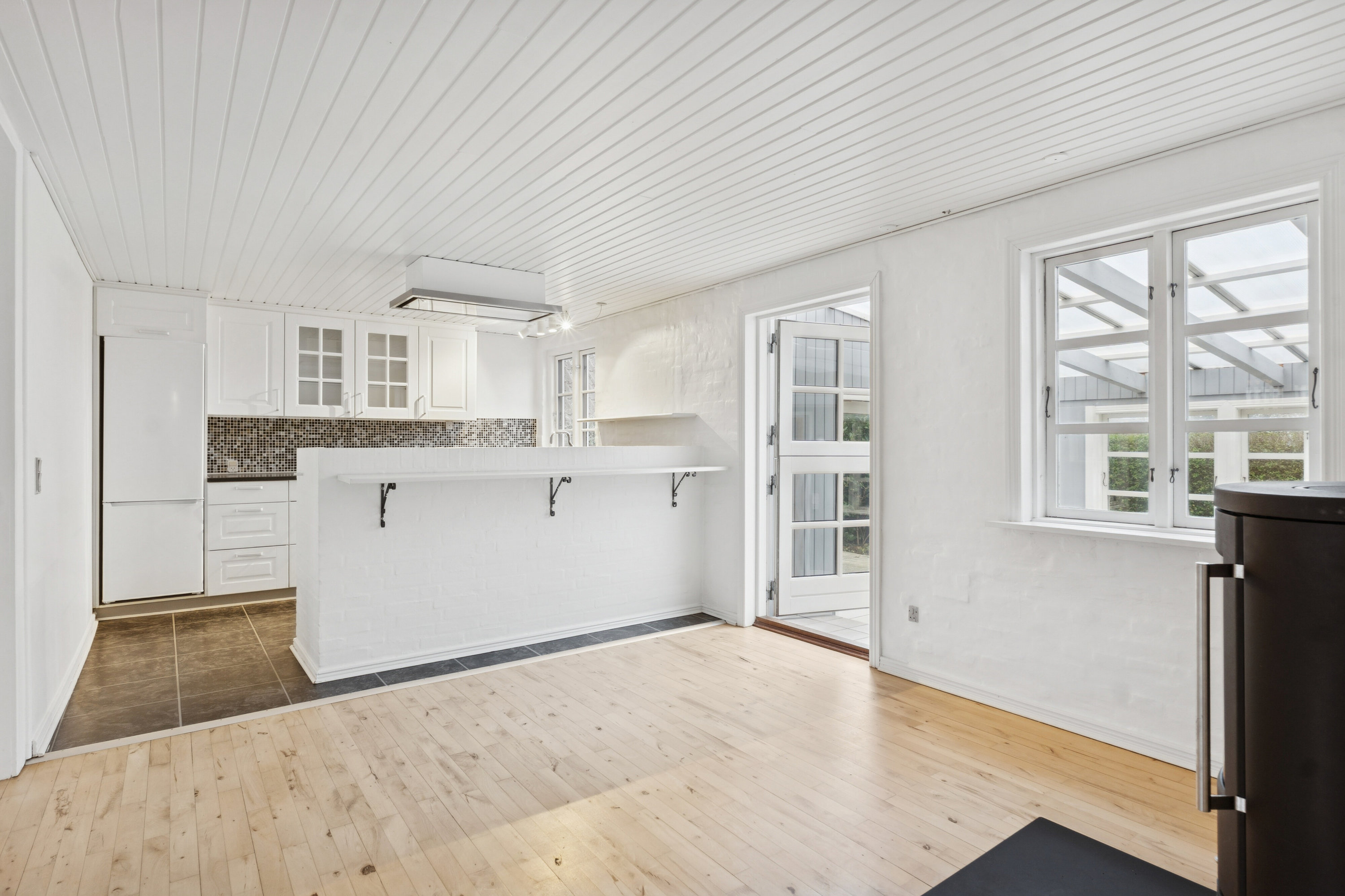 Fremhævet stue billede i fuldskærmstilstand. Billede af Rødbyvej 18, Thurø, 5700 Svendborg