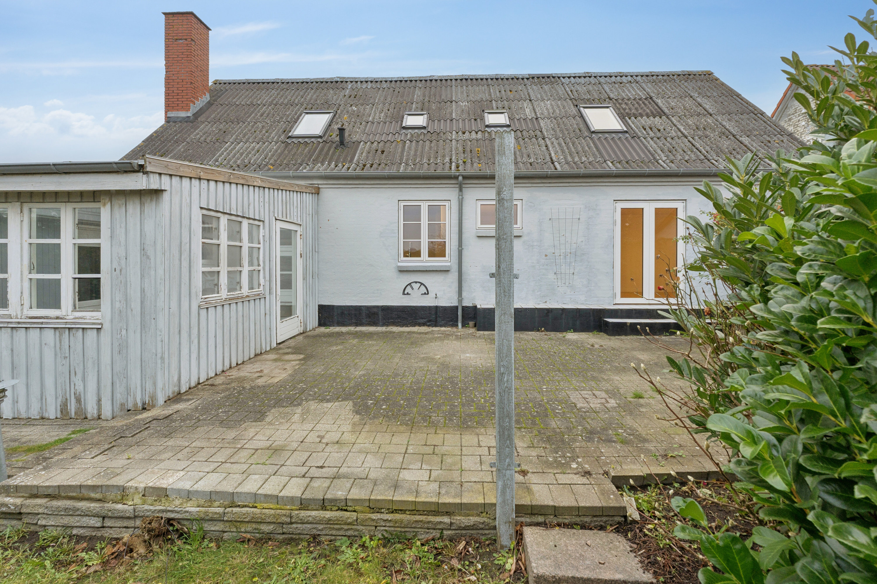 Fremhævet set fra haven billede i fuldskærmstilstand. Billede af Rødbyvej 18, Thurø, 5700 Svendborg