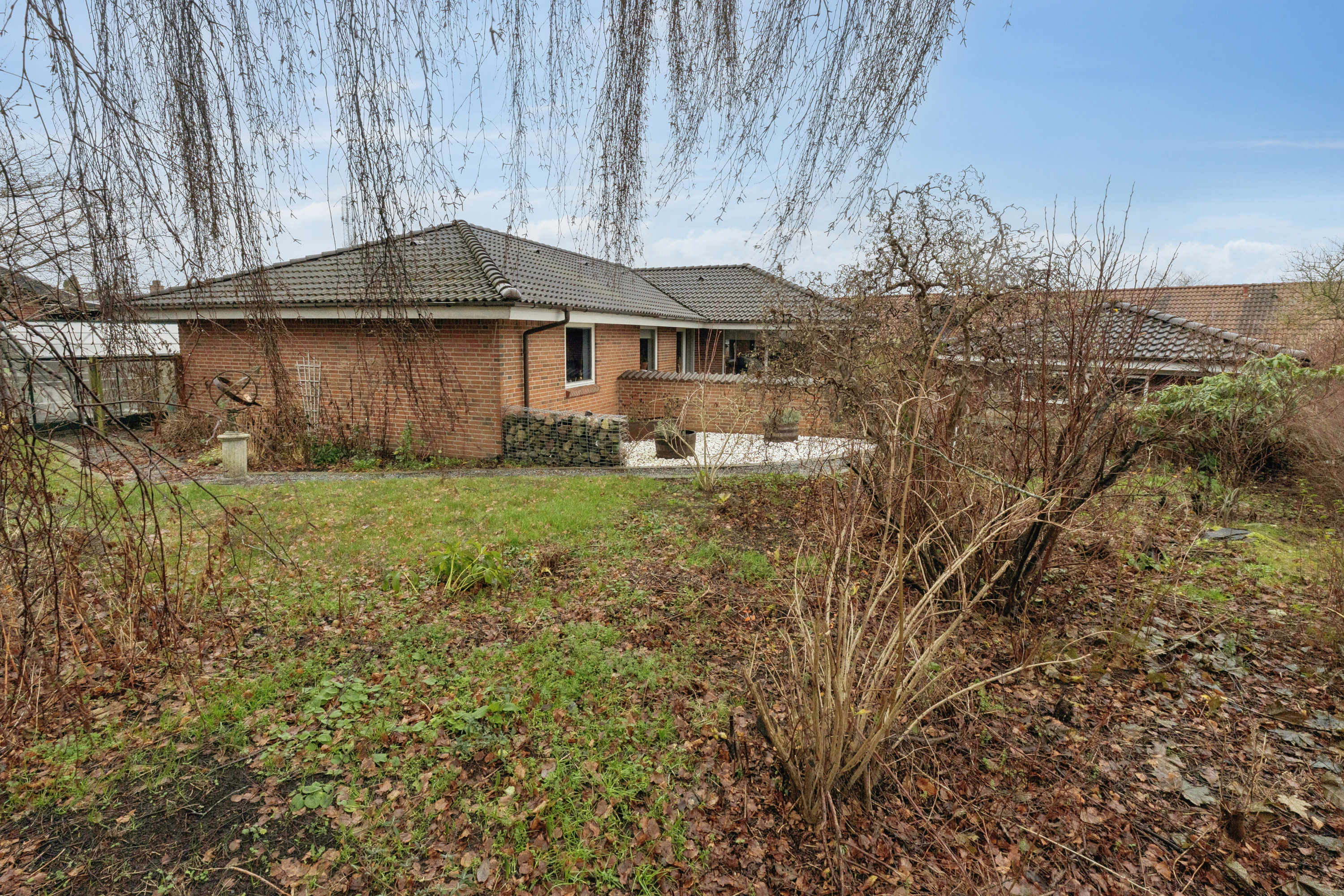 Fremhævet set fra haven billede i fuldskærmstilstand. Billede af Ulstedboparken 46, 9870 Sindal