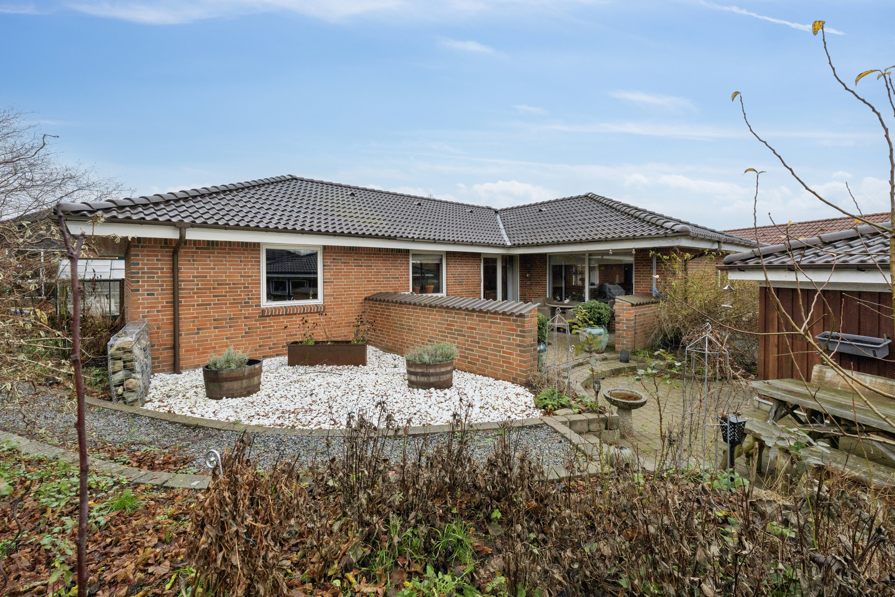 Fremhævet set fra haven billede i fuldskærmstilstand. Billede af Ulstedboparken 46, 9870 Sindal