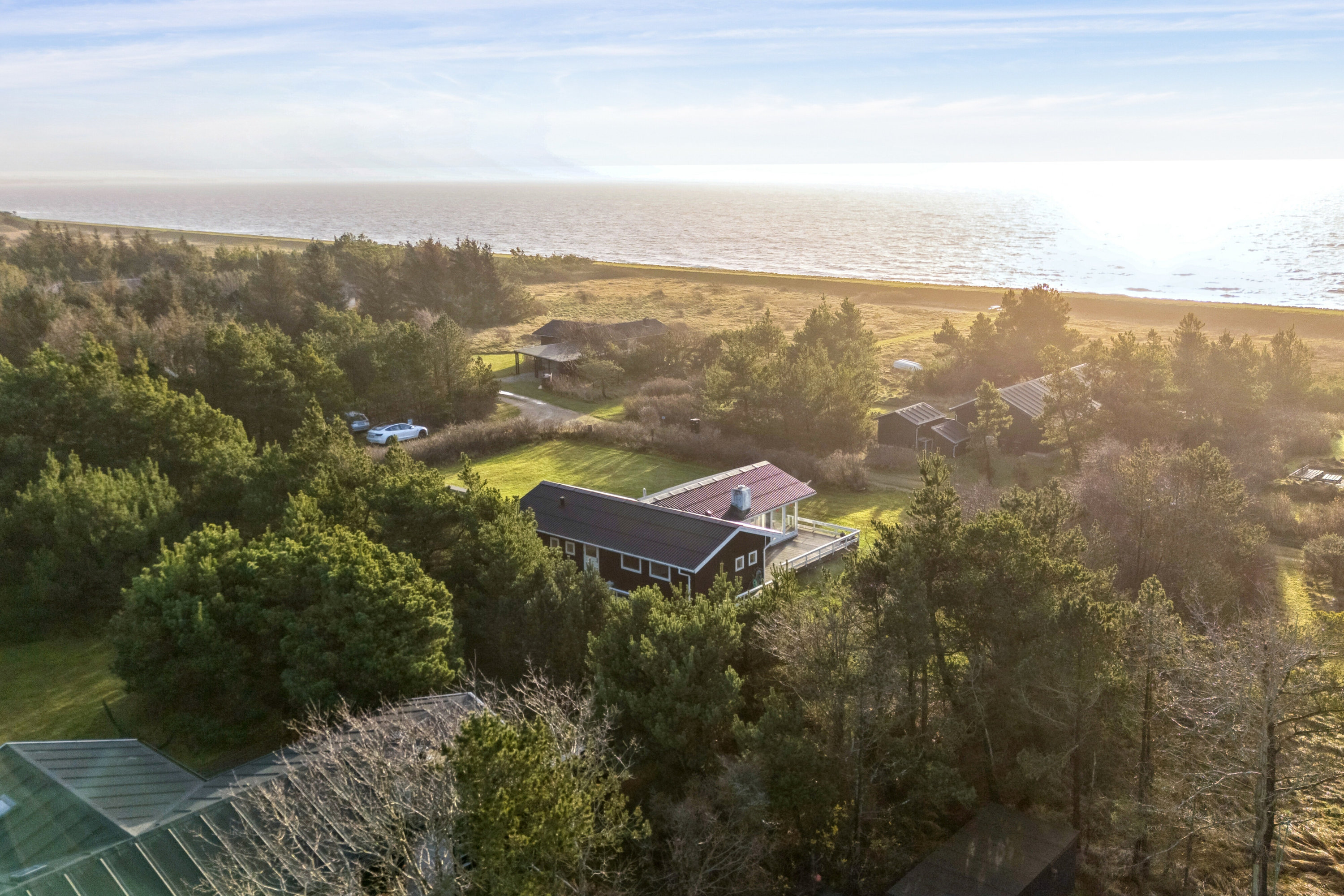 Fremhævet set fra haven billede i fuldskærmstilstand. Billede af Fjordternevej 14, Helligsø, 7760 Hurup Thy