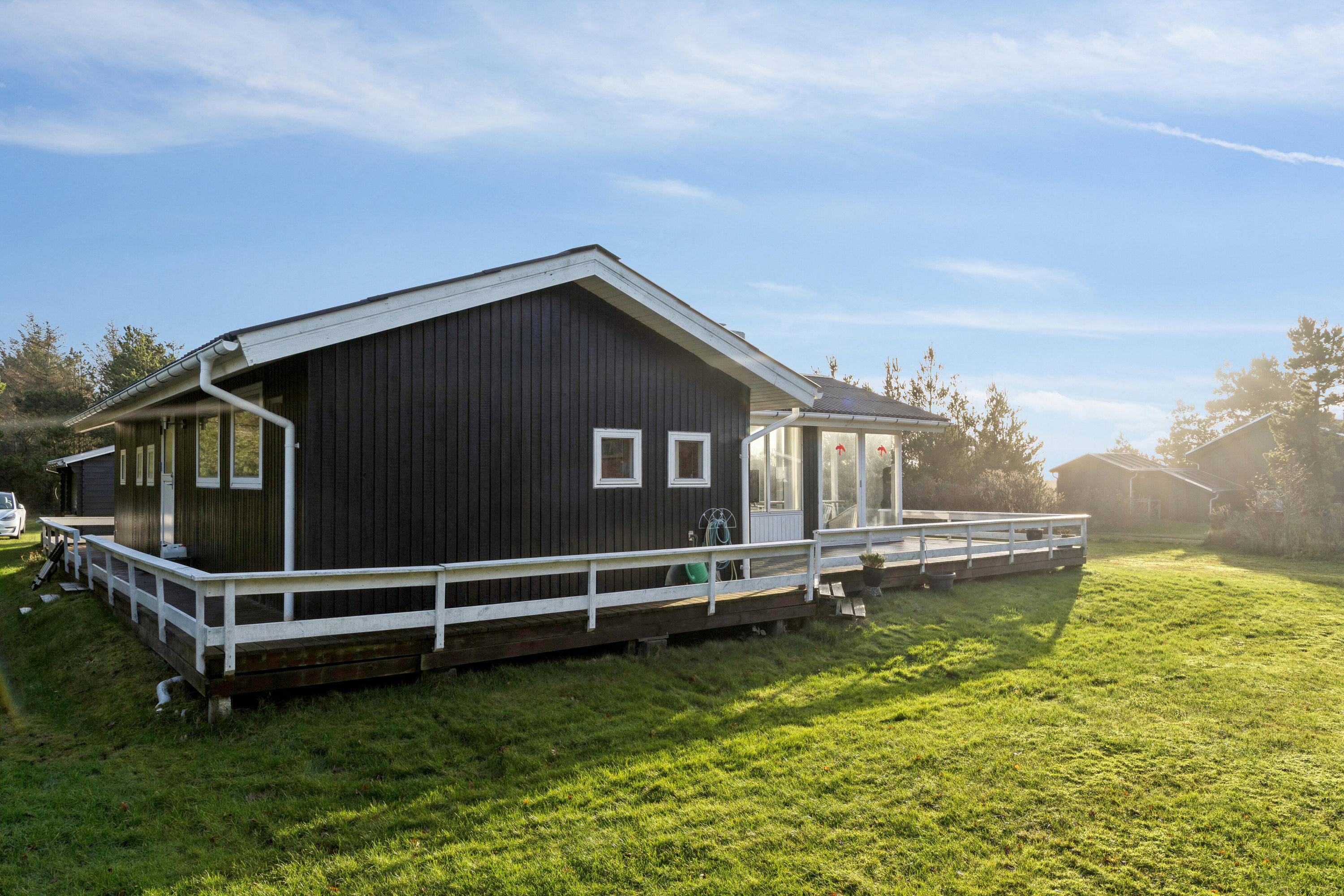 Fremhævet set fra haven billede i fuldskærmstilstand. Billede af Fjordternevej 14, Helligsø, 7760 Hurup Thy