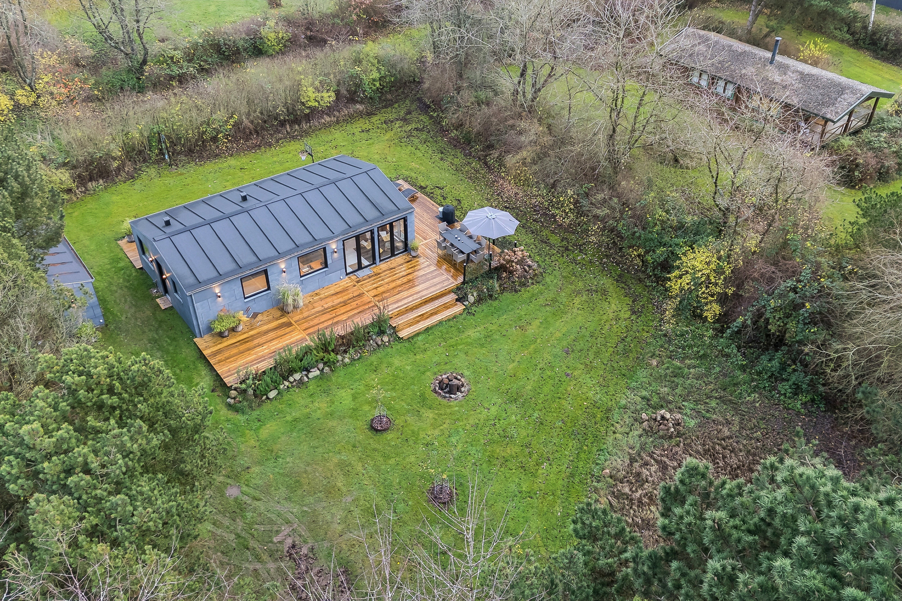 Fremhævet luftfoto billede i fuldskærmstilstand. Billede af Blåklokkevej 12, Stoense Udflytter, 5953 Tranekær