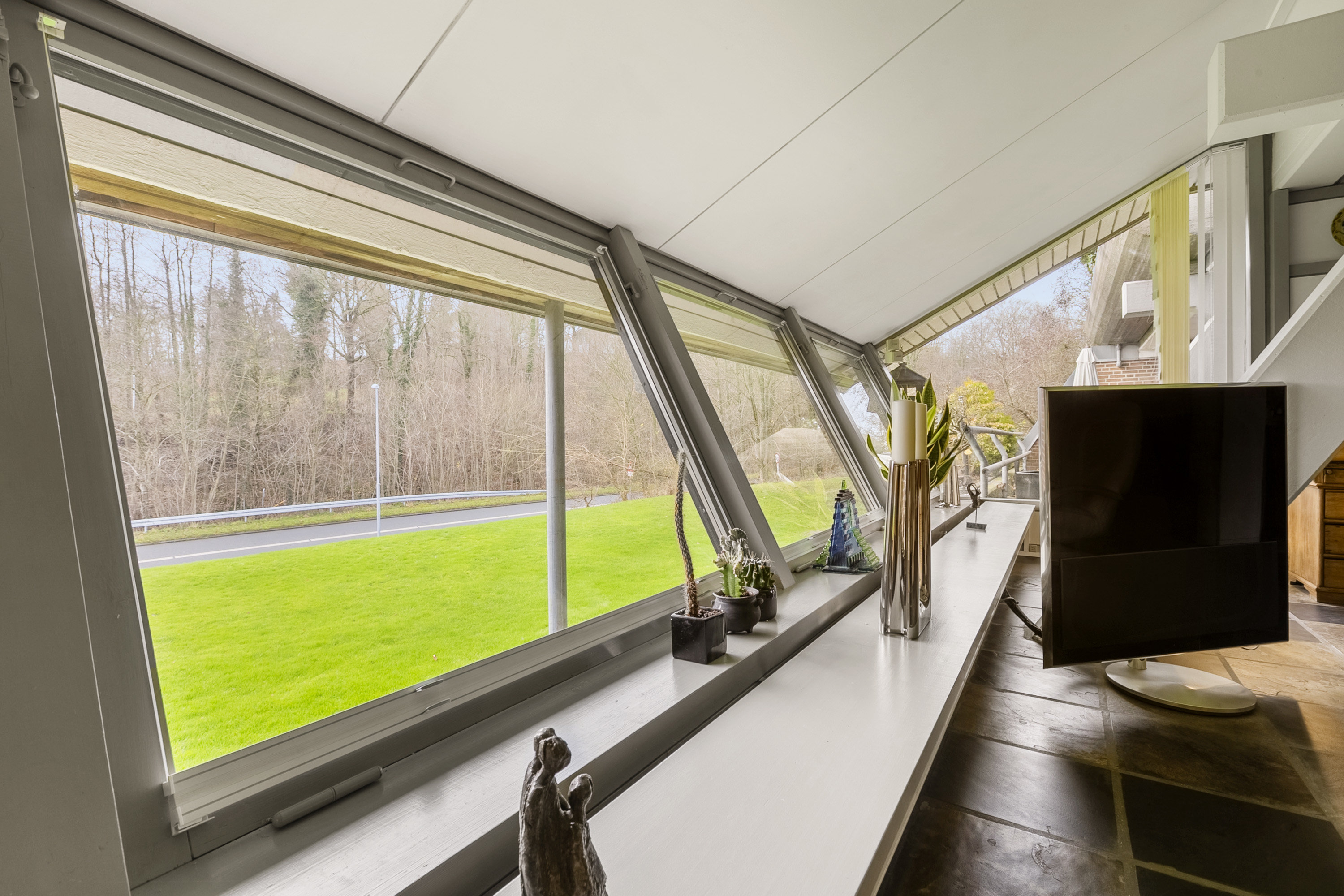 Fremhævet stue billede i fuldskærmstilstand. Billede af Nørreskovvænget 19, 6200 Aabenraa