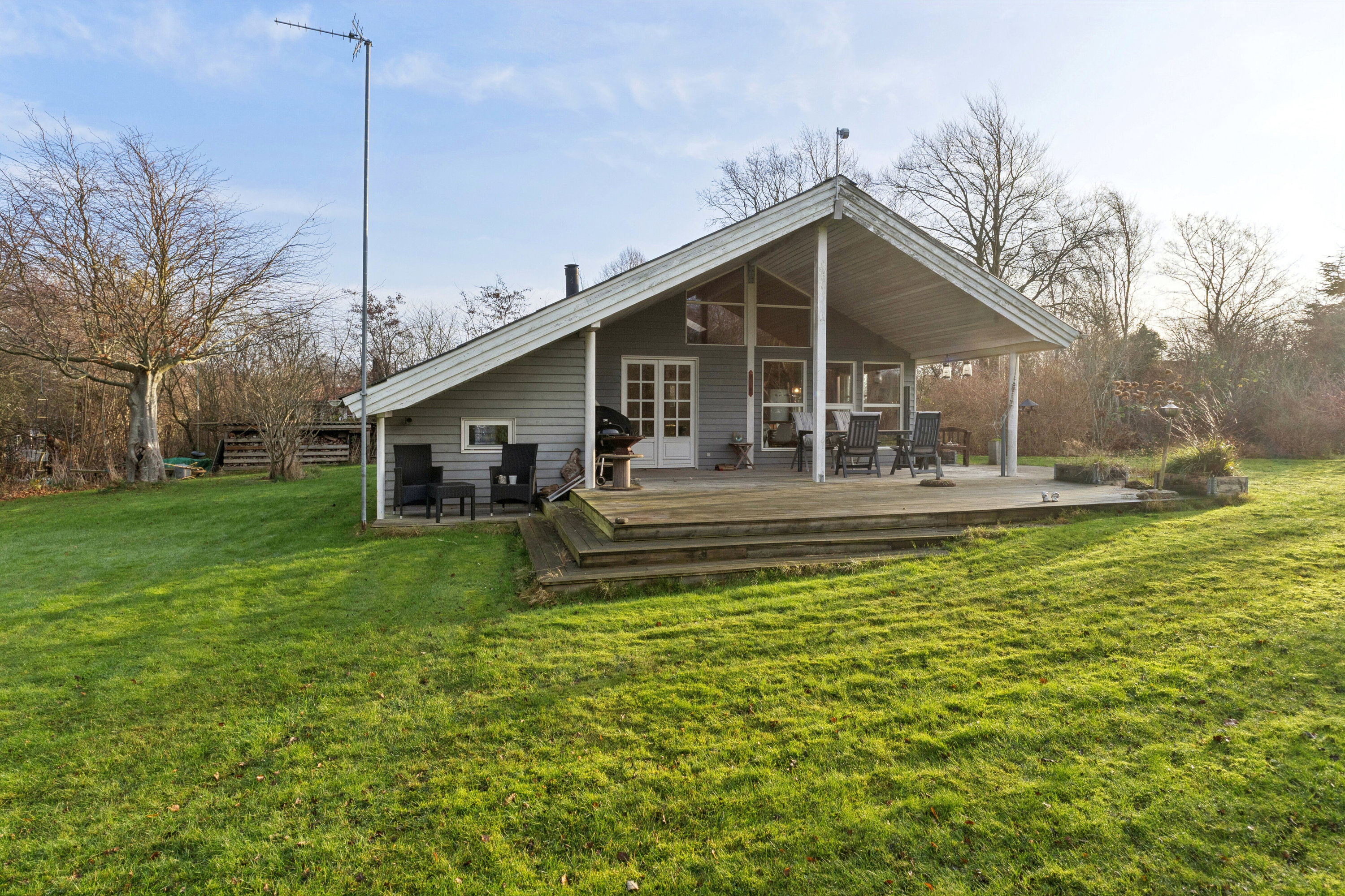 Fremhævet set fra haven billede i fuldskærmstilstand. Billede af Vildrosevej 4, Vesteregnen, 5932 Humble