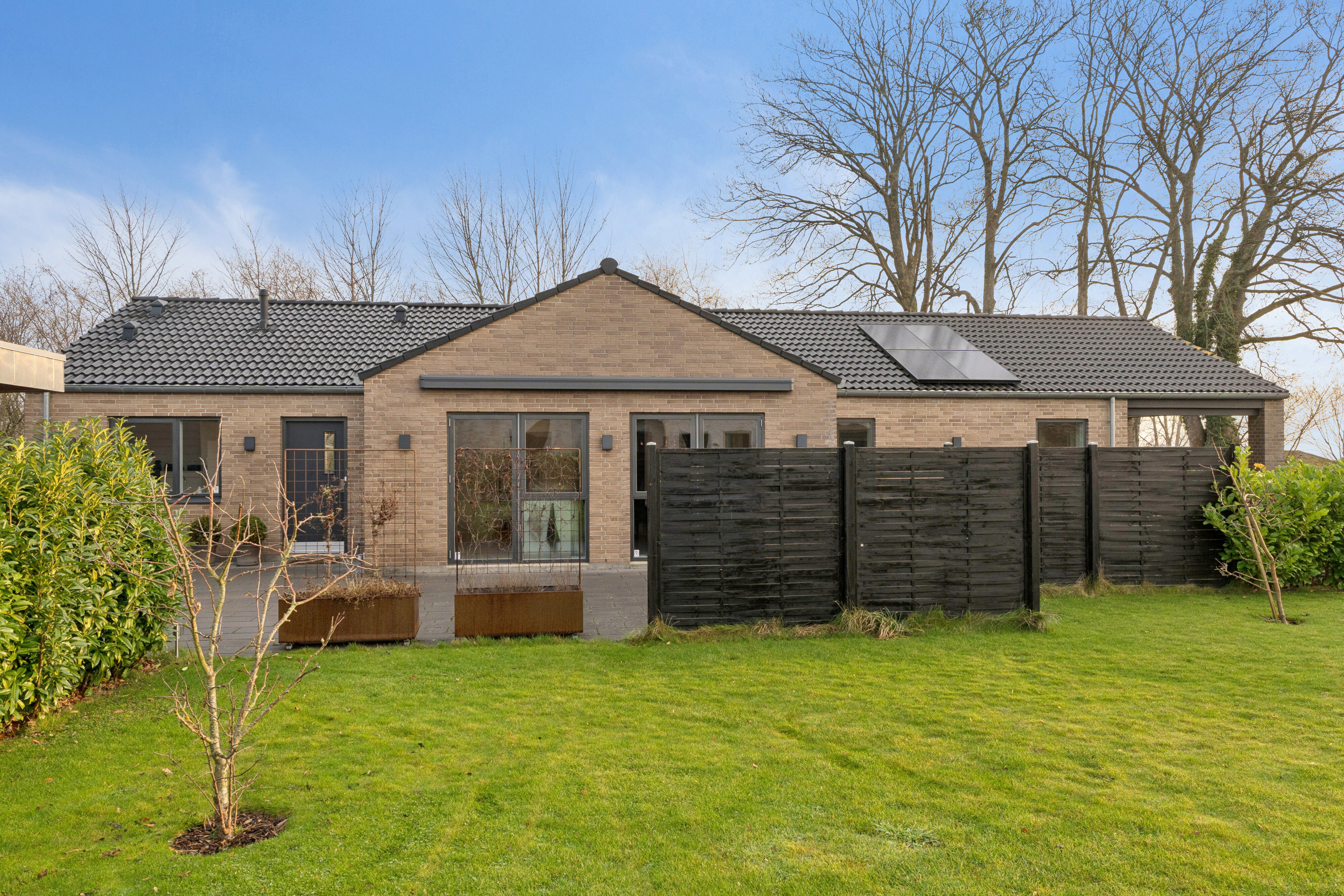 Villa: Set fra haven på Vintervej 7, 4654 Faxe Ladeplads