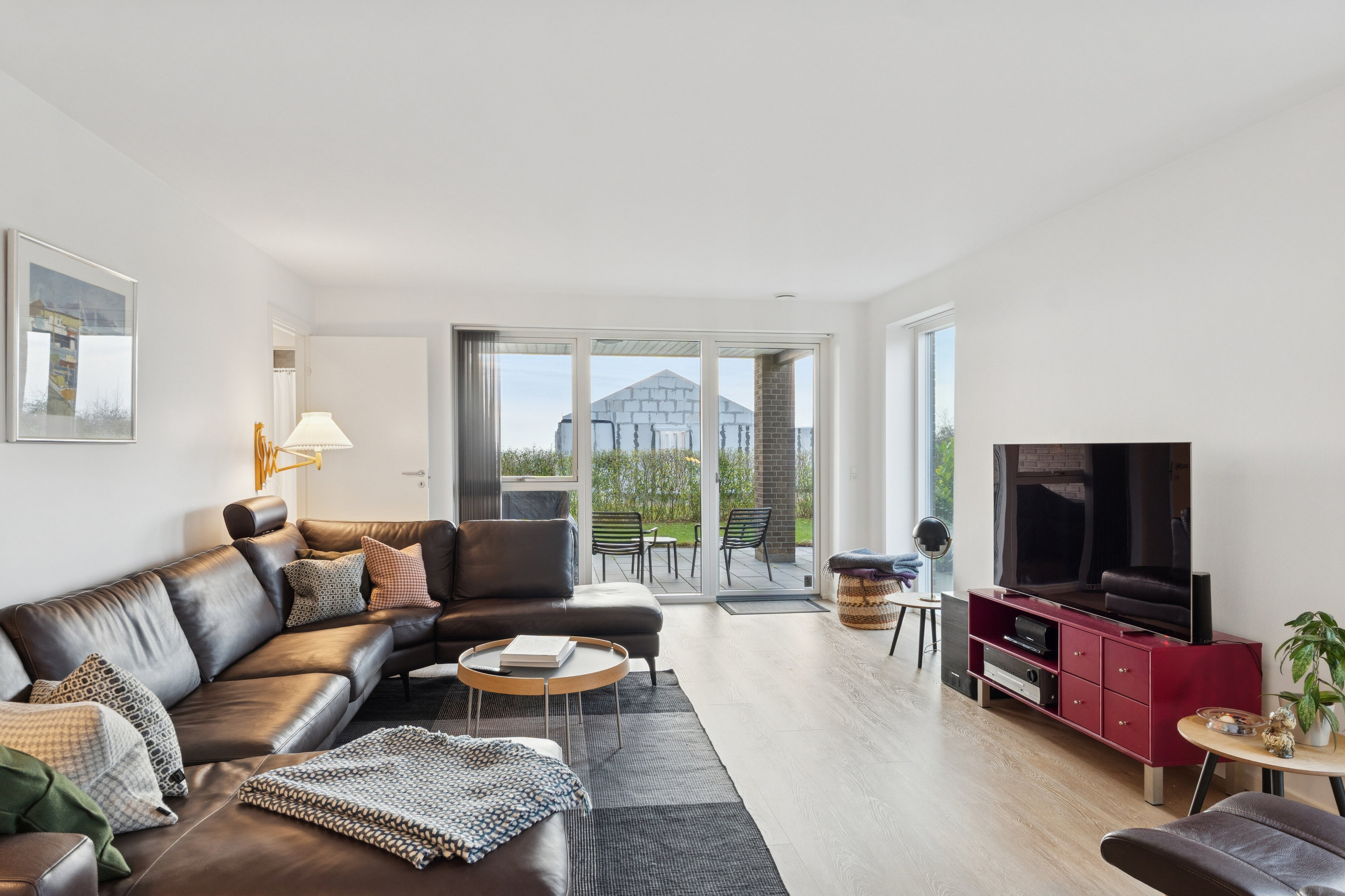 Fremhævet stue billede i fuldskærmstilstand. Billede af Vintervej 7, 4654 Faxe Ladeplads