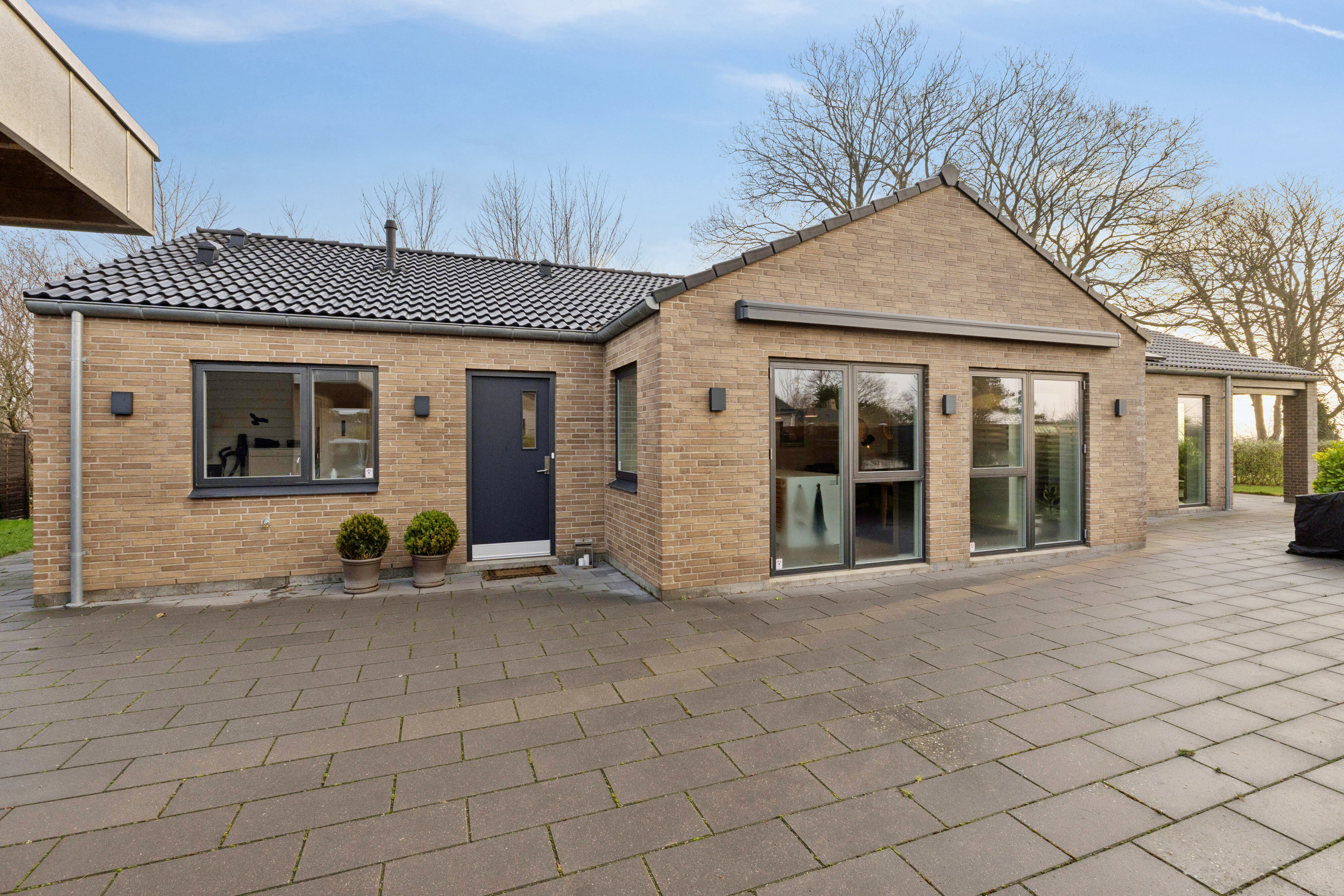 Fremhævet udendørs billede i fuldskærmstilstand. Billede af Vintervej 7, 4654 Faxe Ladeplads