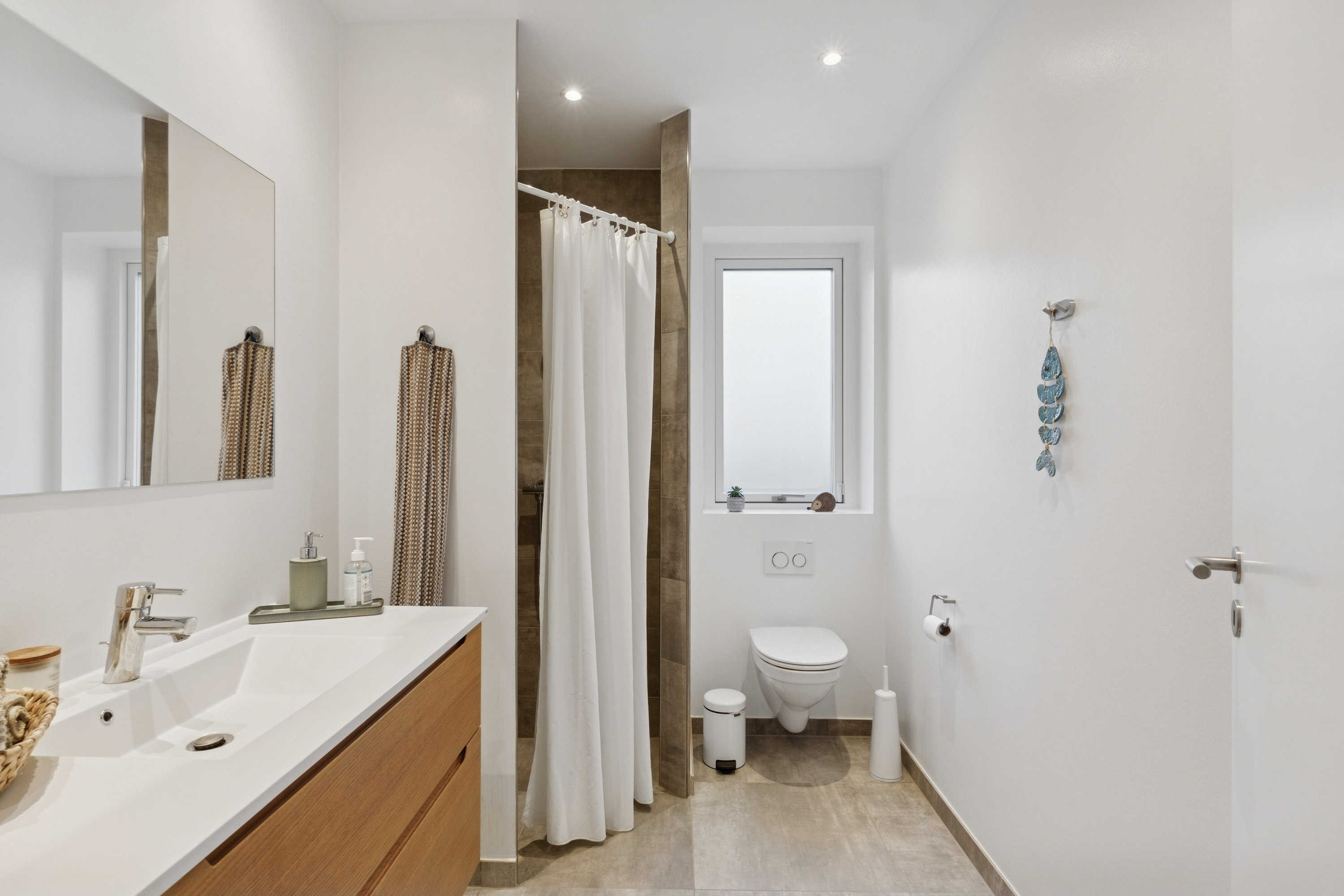 Fremhævet badeværelse billede i fuldskærmstilstand. Billede af Vintervej 7, 4654 Faxe Ladeplads