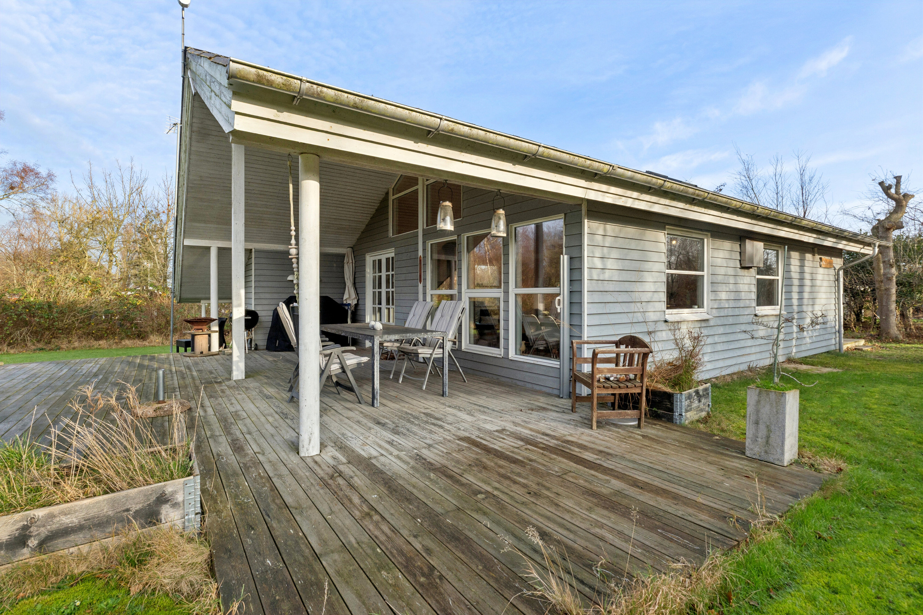 Fremhævet set fra haven billede i fuldskærmstilstand. Billede af Vildrosevej 4, Vesteregnen, 5932 Humble