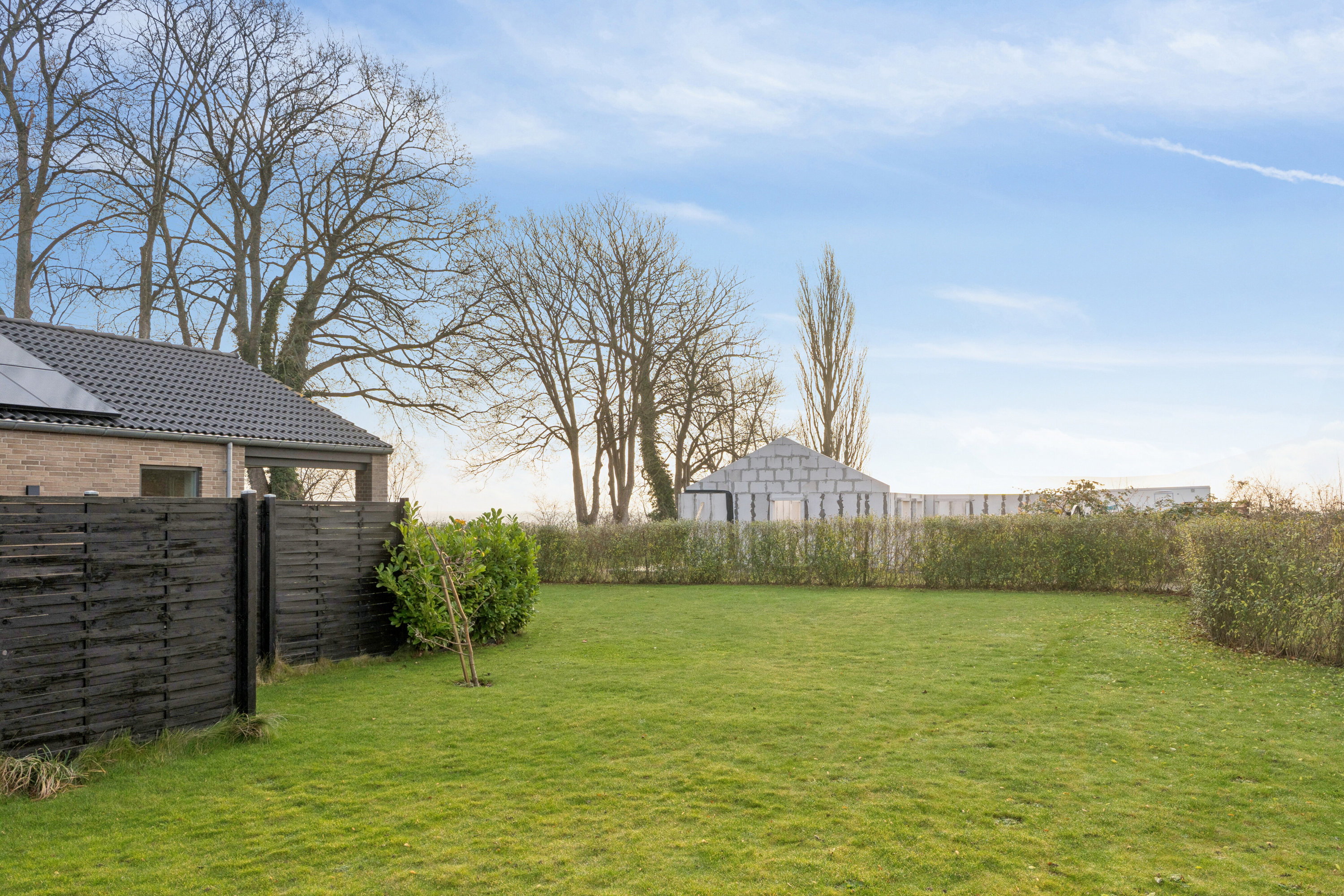 Fremhævet udendørs billede i fuldskærmstilstand. Billede af Vintervej 7, 4654 Faxe Ladeplads