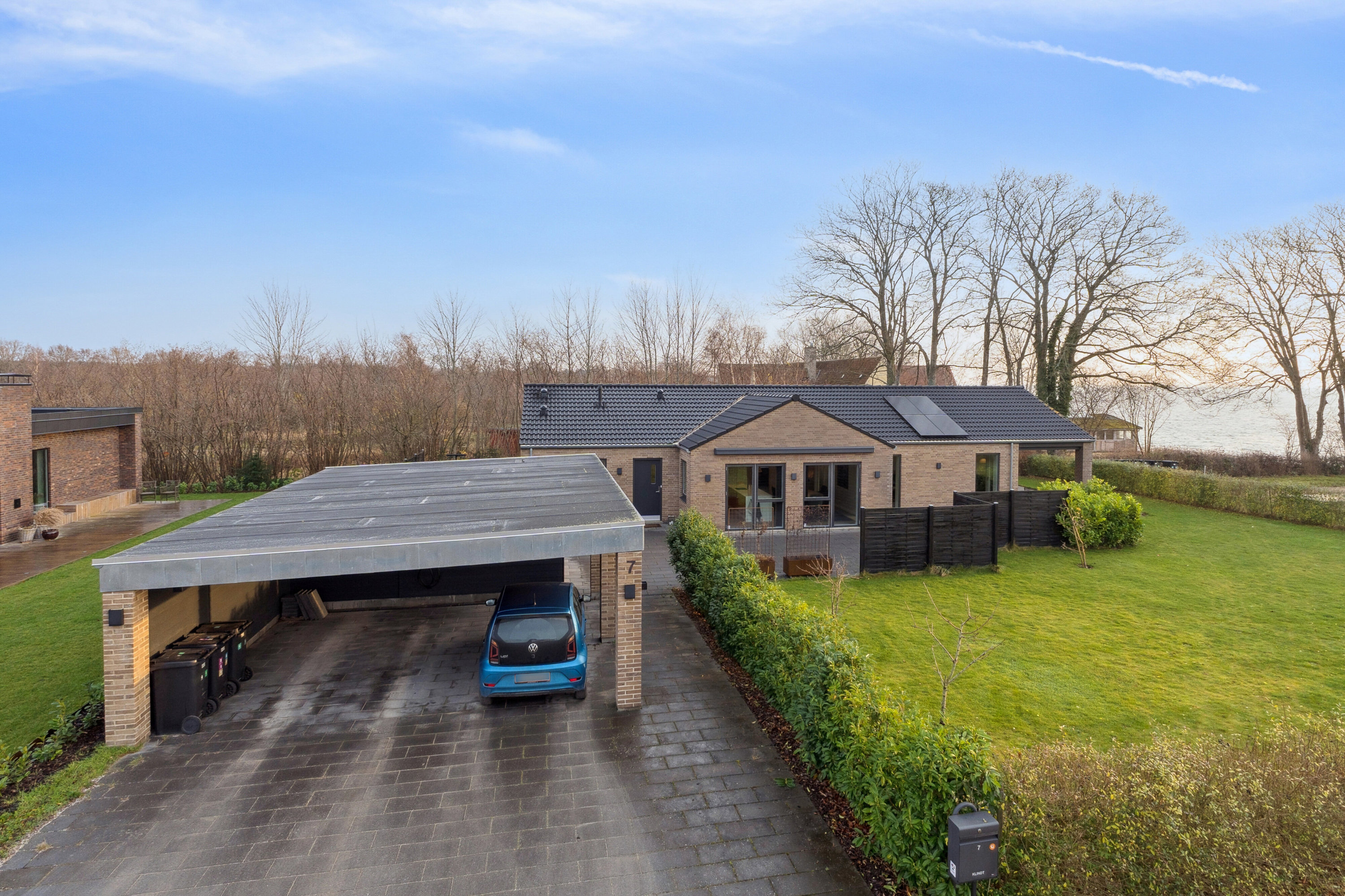 Fremhævet set fra vejen billede i fuldskærmstilstand. Billede af Vintervej 7, 4654 Faxe Ladeplads