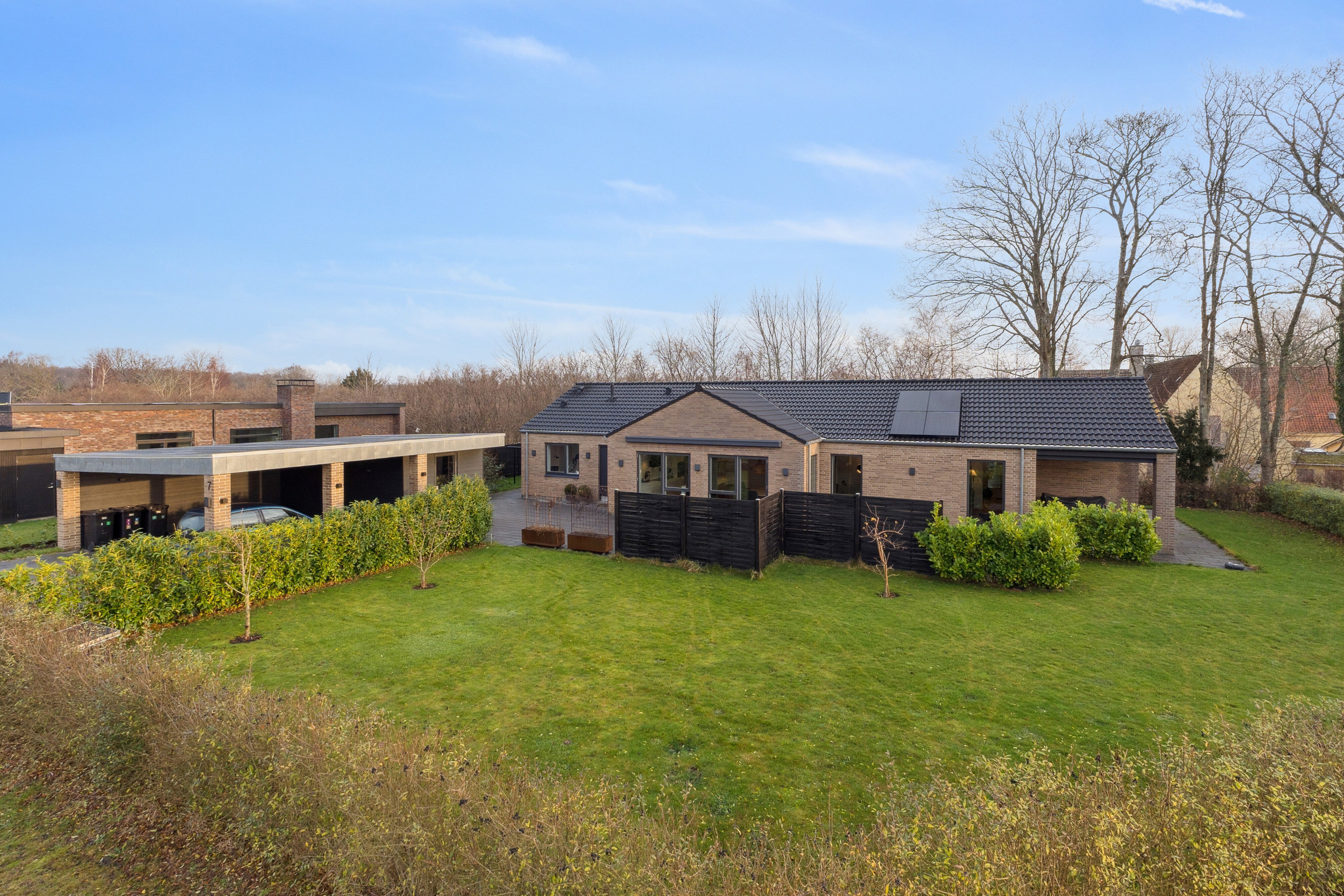 Fremhævet set fra haven billede i fuldskærmstilstand. Billede af Vintervej 7, 4654 Faxe Ladeplads