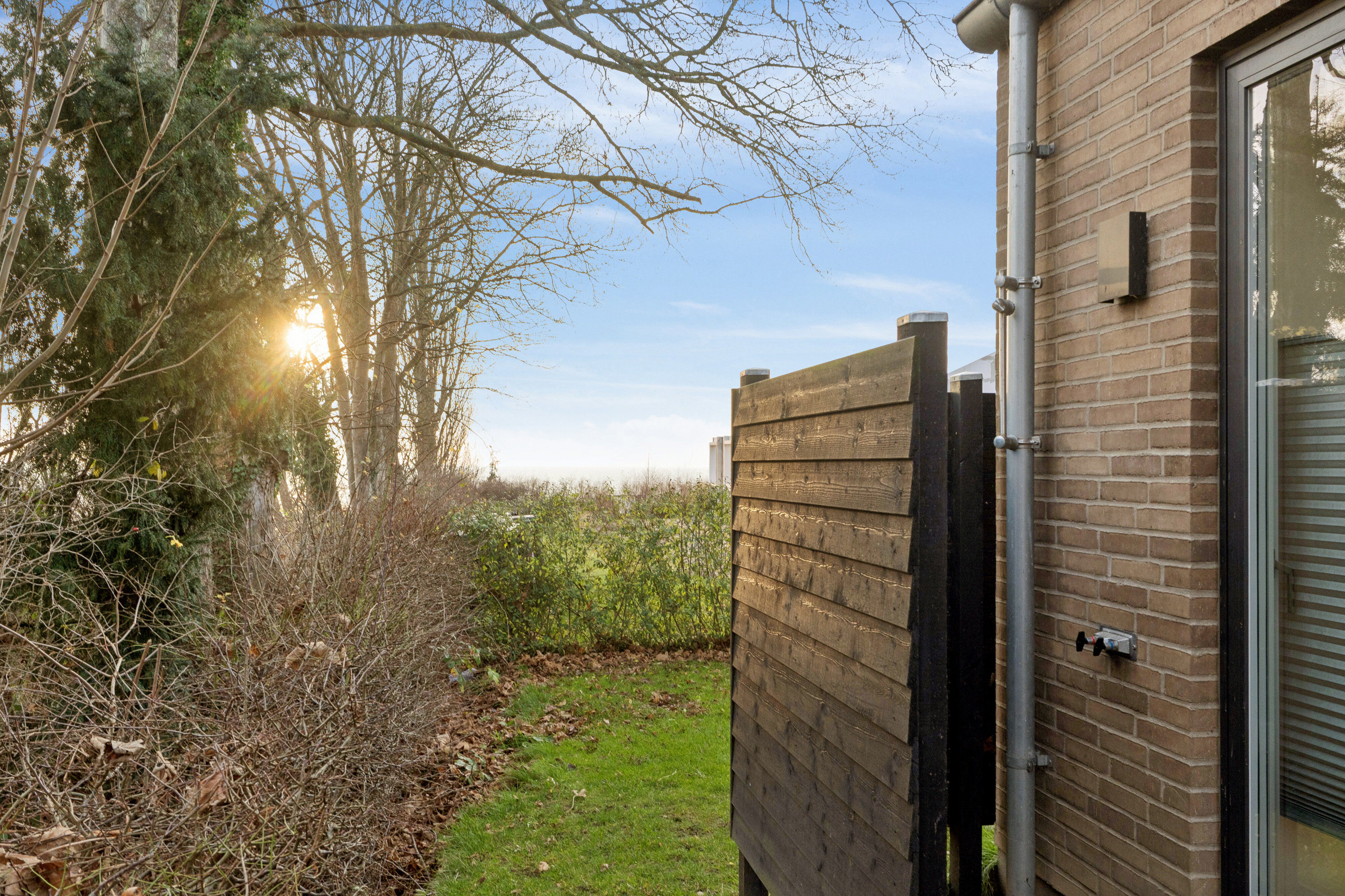 Fremhævet udendørs billede i fuldskærmstilstand. Billede af Vintervej 7, 4654 Faxe Ladeplads