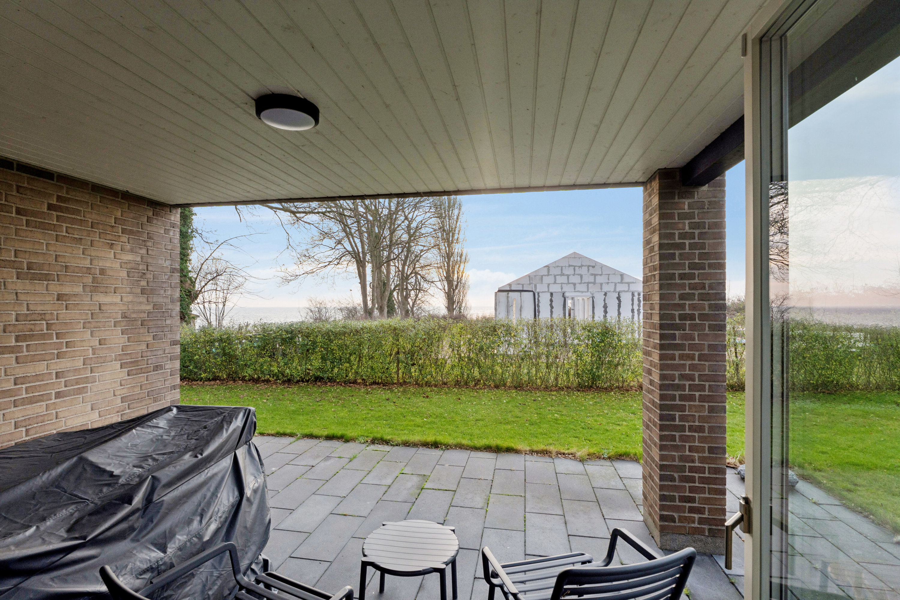 Fremhævet udendørs billede i fuldskærmstilstand. Billede af Vintervej 7, 4654 Faxe Ladeplads