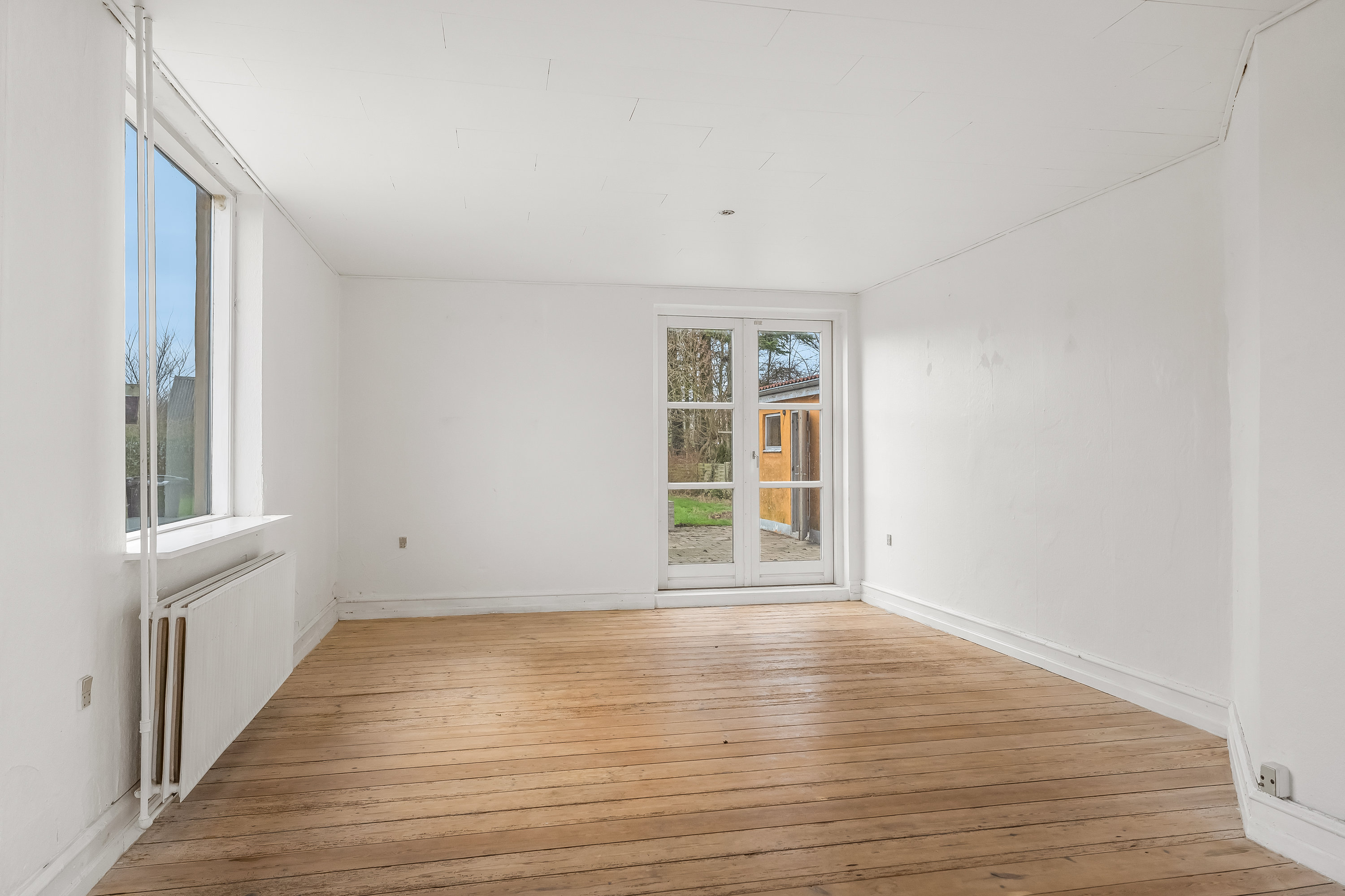 Fremhævet stue billede i fuldskærmstilstand. Billede af Kirke Allé 52, 4970 Rødby