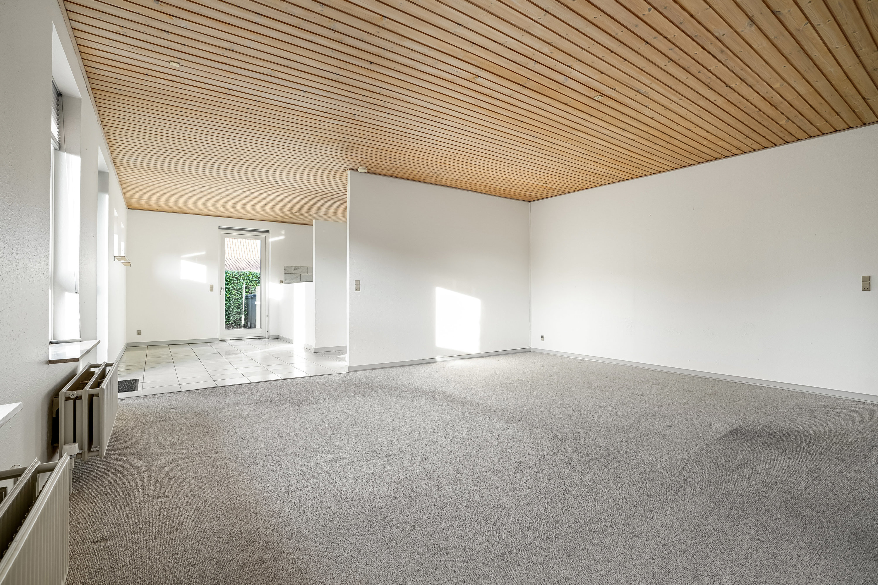 Fremhævet stue billede i fuldskærmstilstand. Billede af Møllehaven 1B, 5500 Middelfart