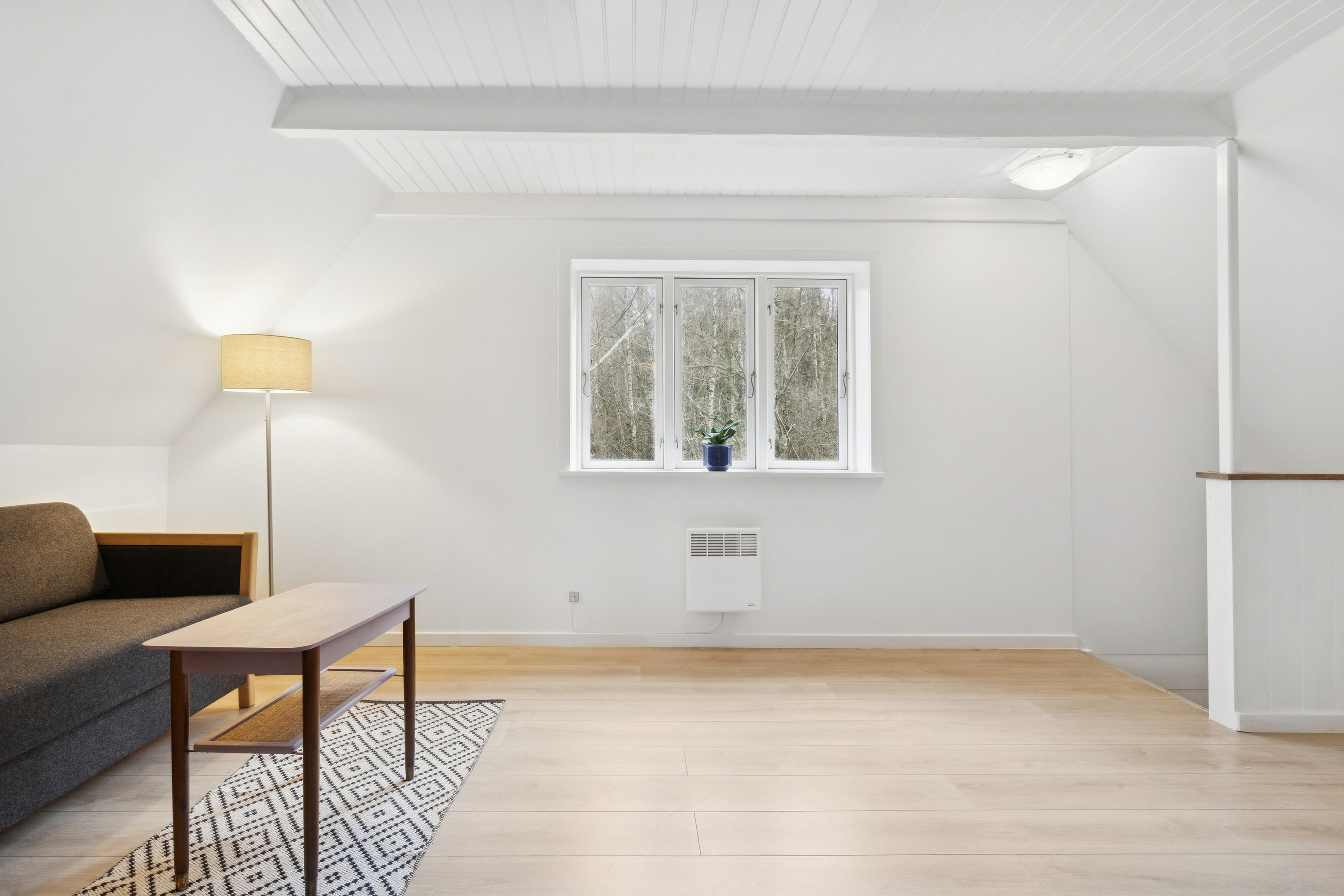 Fremhævet stue billede i fuldskærmstilstand. Billede af Bolsterbjergvej 18, Aarsballe, 3700 Rønne