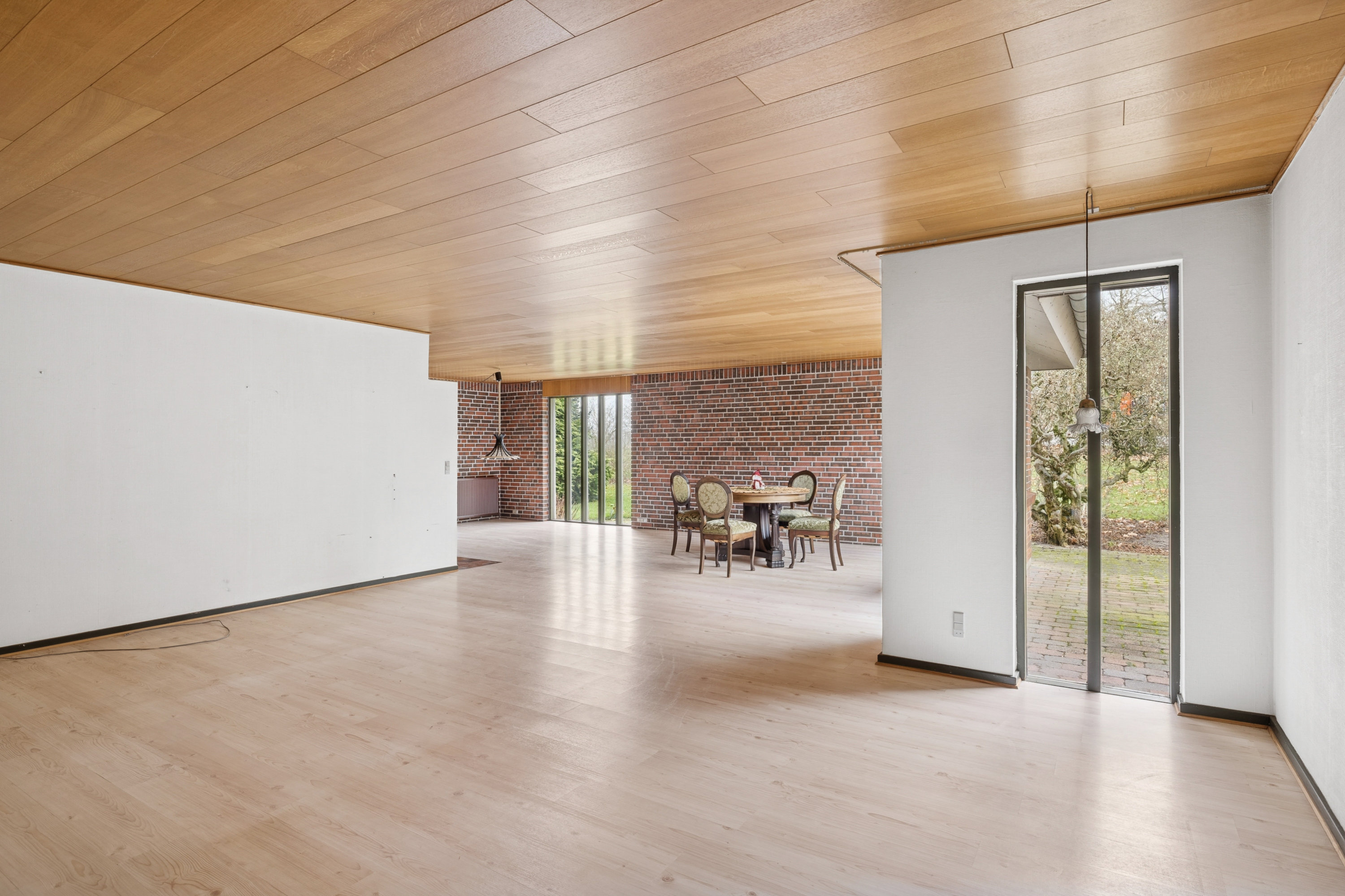 Fremhævet stue billede i fuldskærmstilstand. Billede af Løvelbrovej 12, Pederstrup, 8830 Tjele