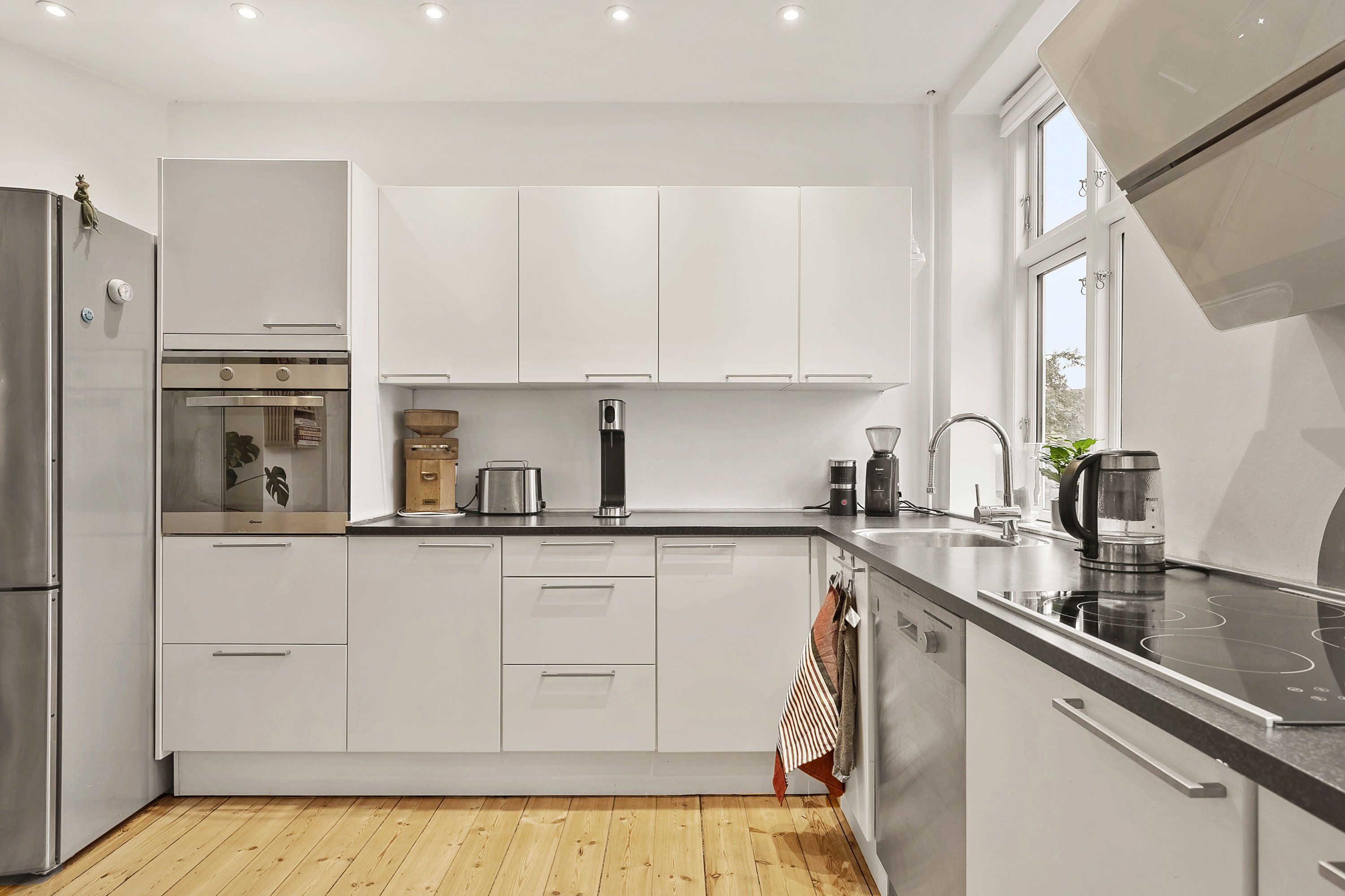 Fremhævet køkken billede i fuldskærmstilstand. Billede af Østervænget 3, 1., 5000 Odense C