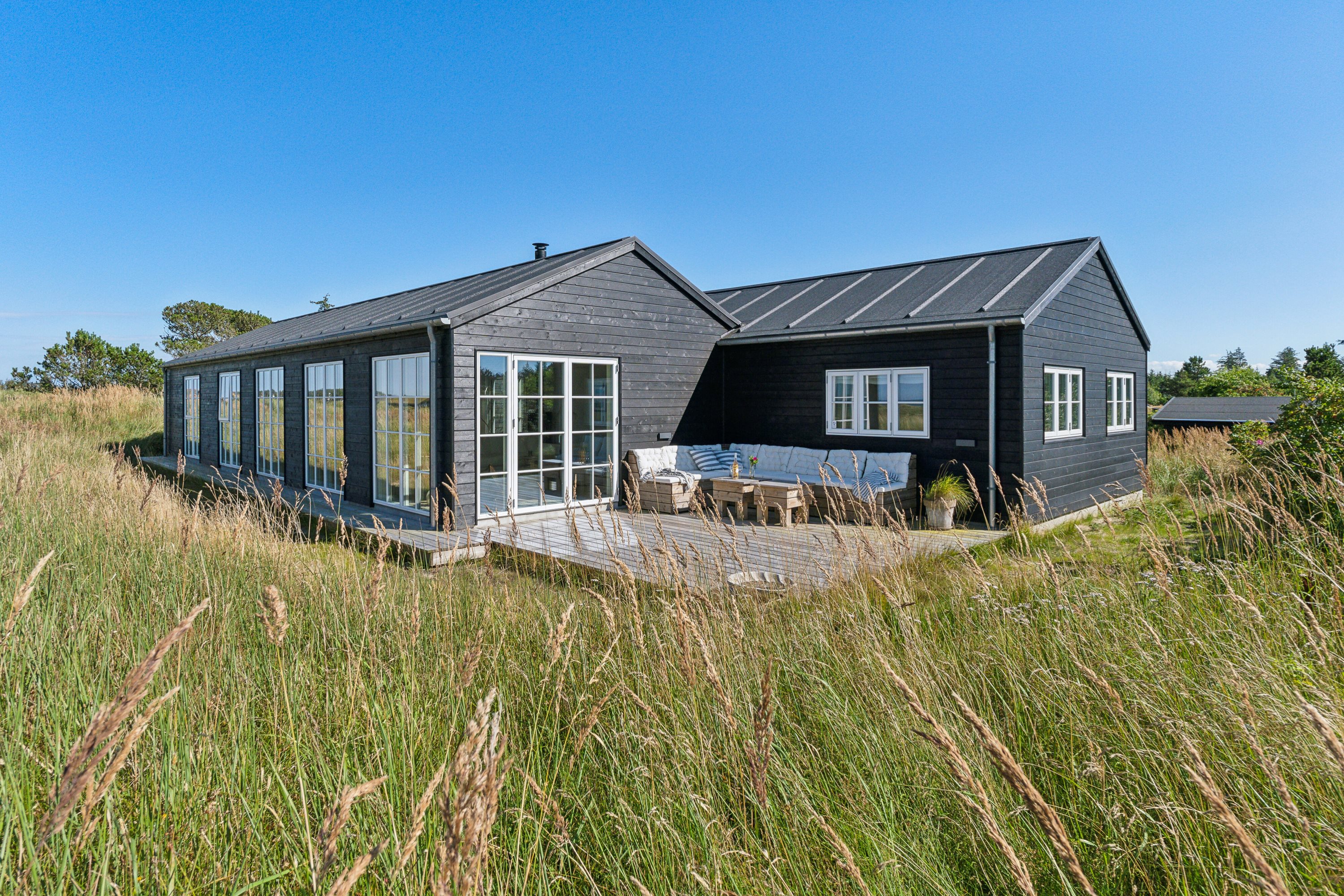 Fremhævet set fra haven billede i fuldskærmstilstand. Billede af Abelvej 7, Tversted, 9881 Bindslev