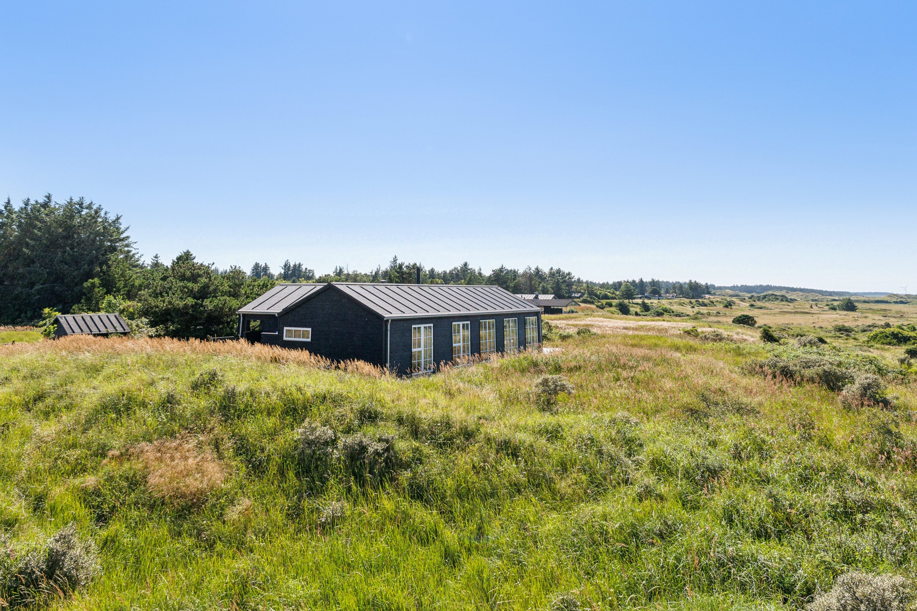 Fremhævet set fra haven billede i fuldskærmstilstand. Billede af Abelvej 7, Tversted, 9881 Bindslev