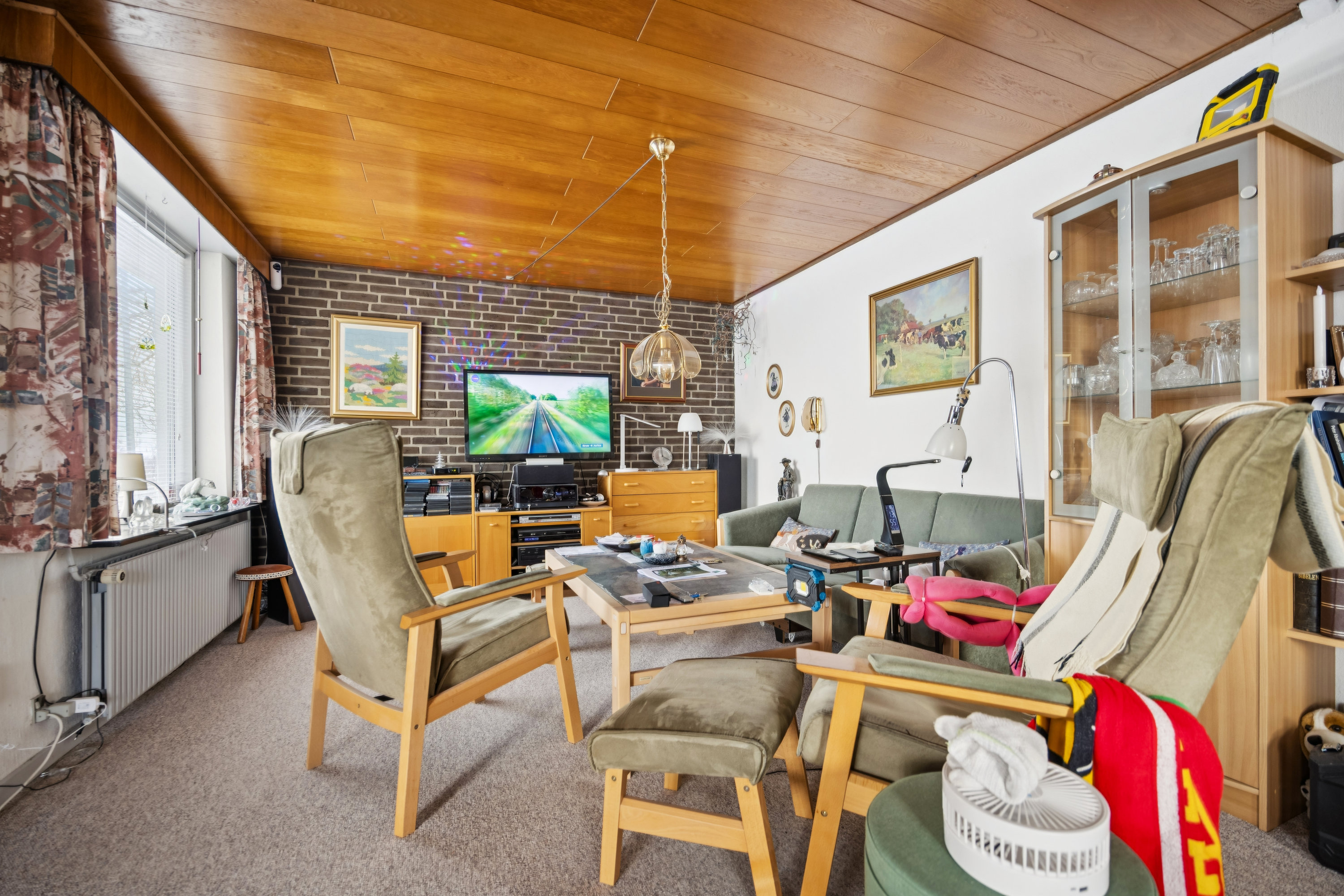 Fremhævet stue billede i fuldskærmstilstand. Billede af Romdrupvej 9, 9270 Klarup