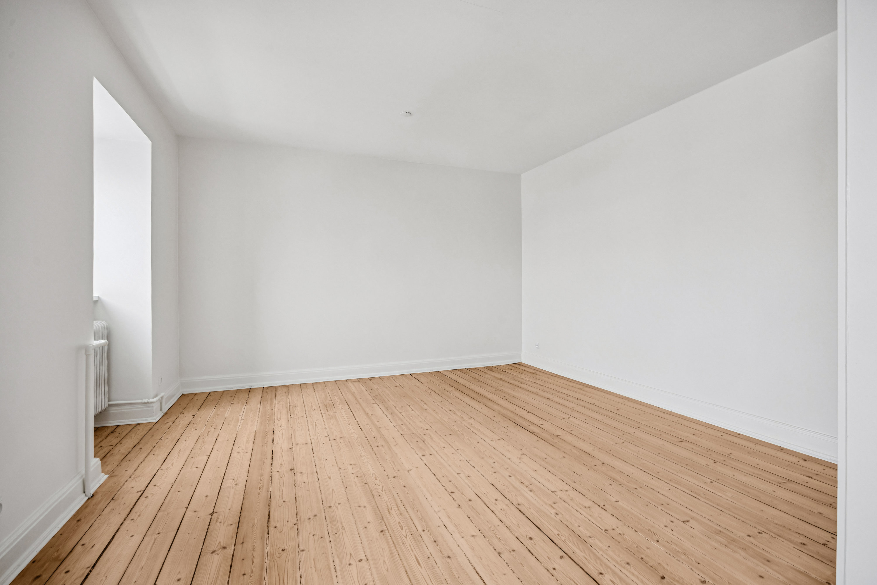 Fremhævet stue billede i fuldskærmstilstand. Billede af Østre Alle 42, 2. tv., 9000 Aalborg