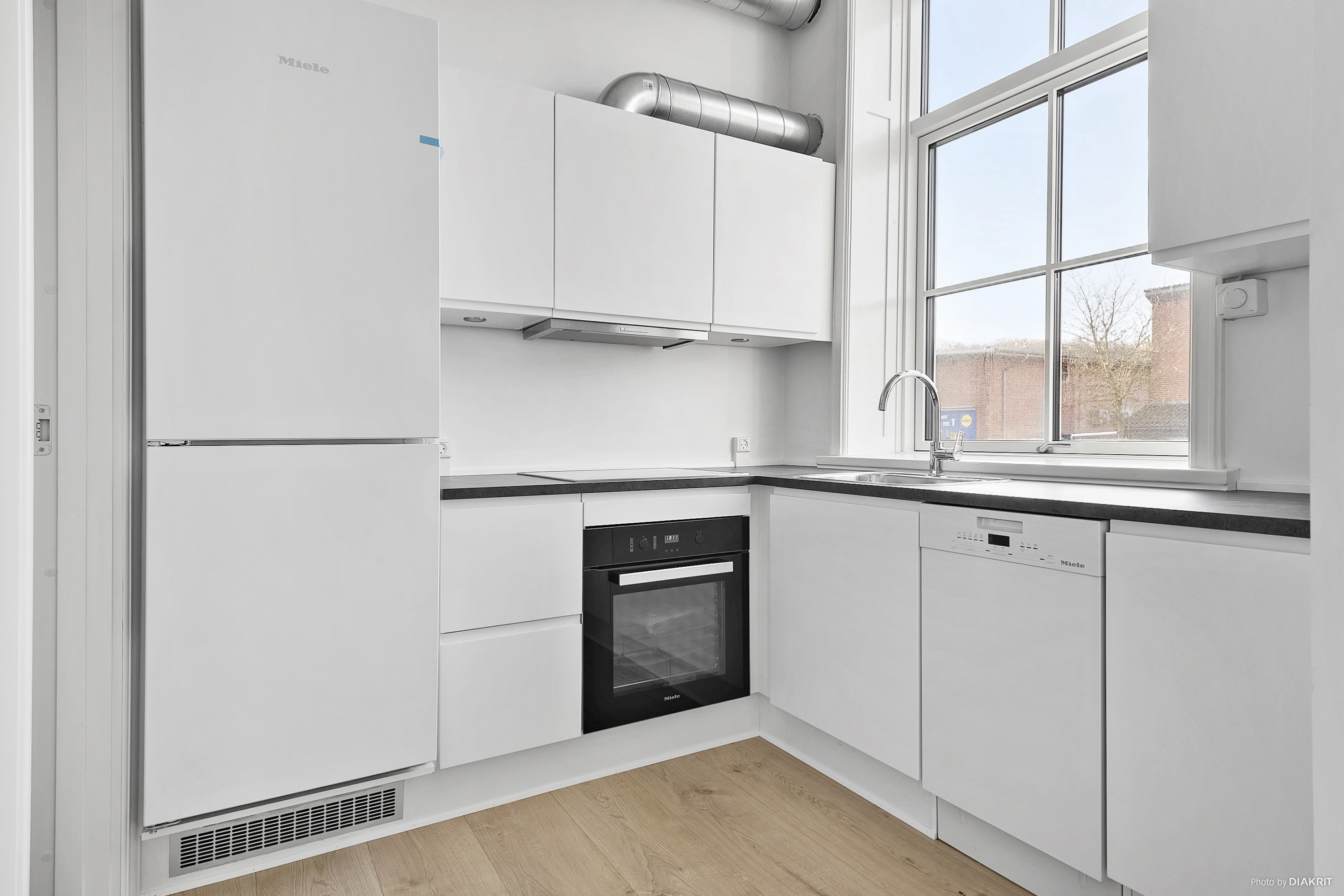 Fremhævet køkken billede i fuldskærmstilstand. Billede af Banegårdsgade 25A, st.., 8300 Odder