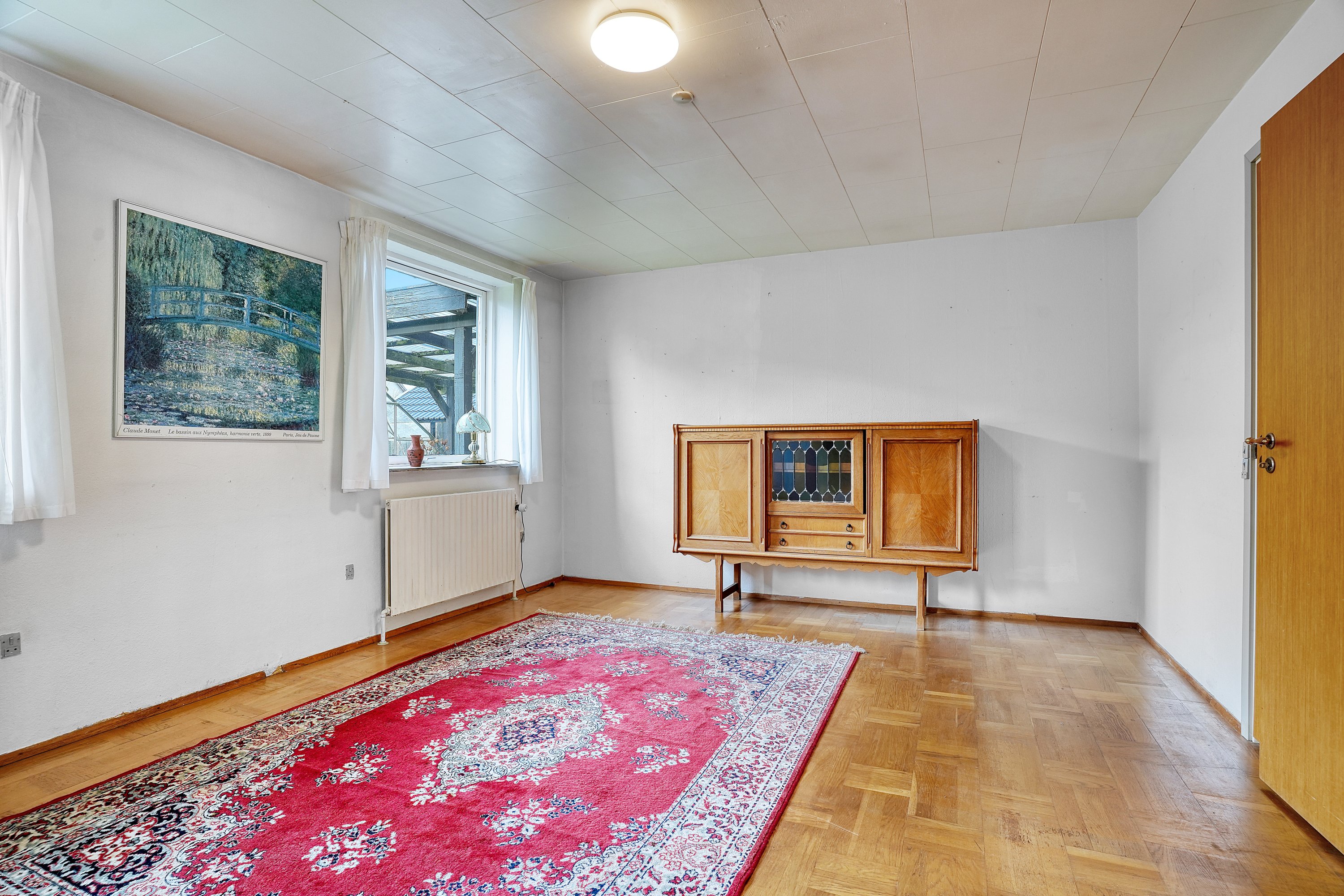 Fremhævet stue billede i fuldskærmstilstand. Billede af Glostrupvej 1, Egebjerg, 4500 Nykøbing Sj