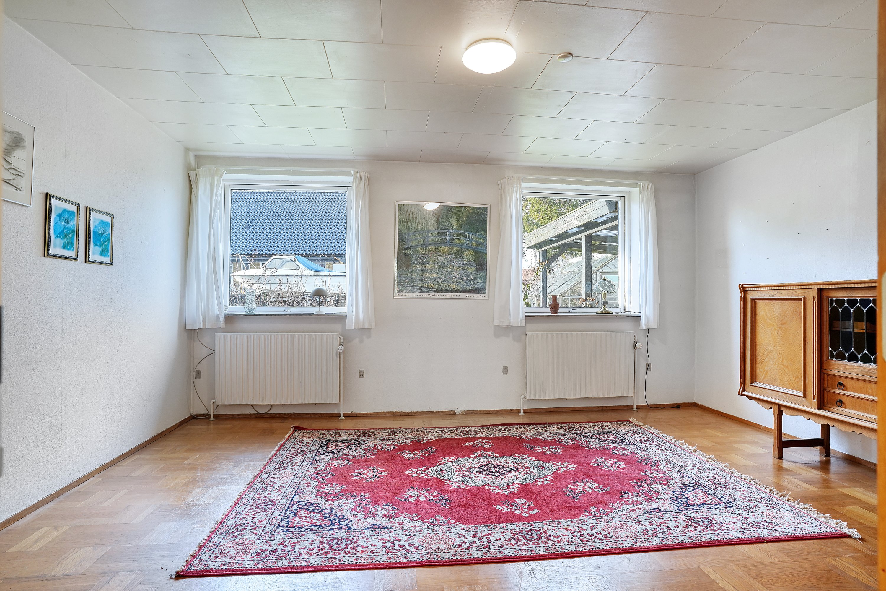 Fremhævet stue billede i fuldskærmstilstand. Billede af Glostrupvej 1, Egebjerg, 4500 Nykøbing Sj