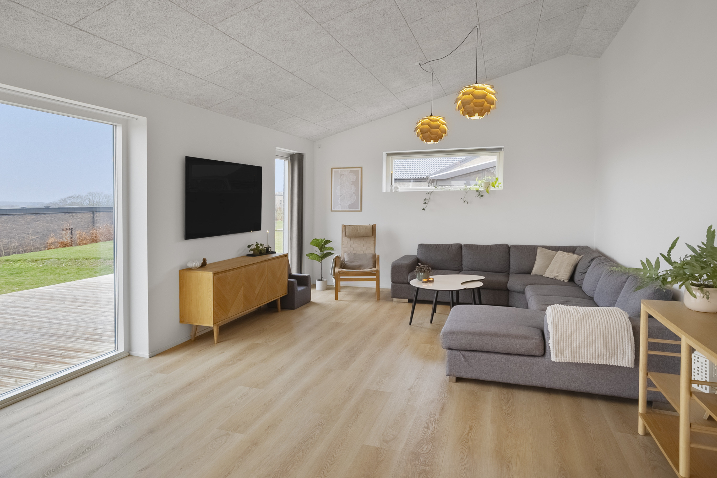 Fremhævet stue billede i fuldskærmstilstand. Billede af Provstlund Skovvej 77, 8700 Horsens