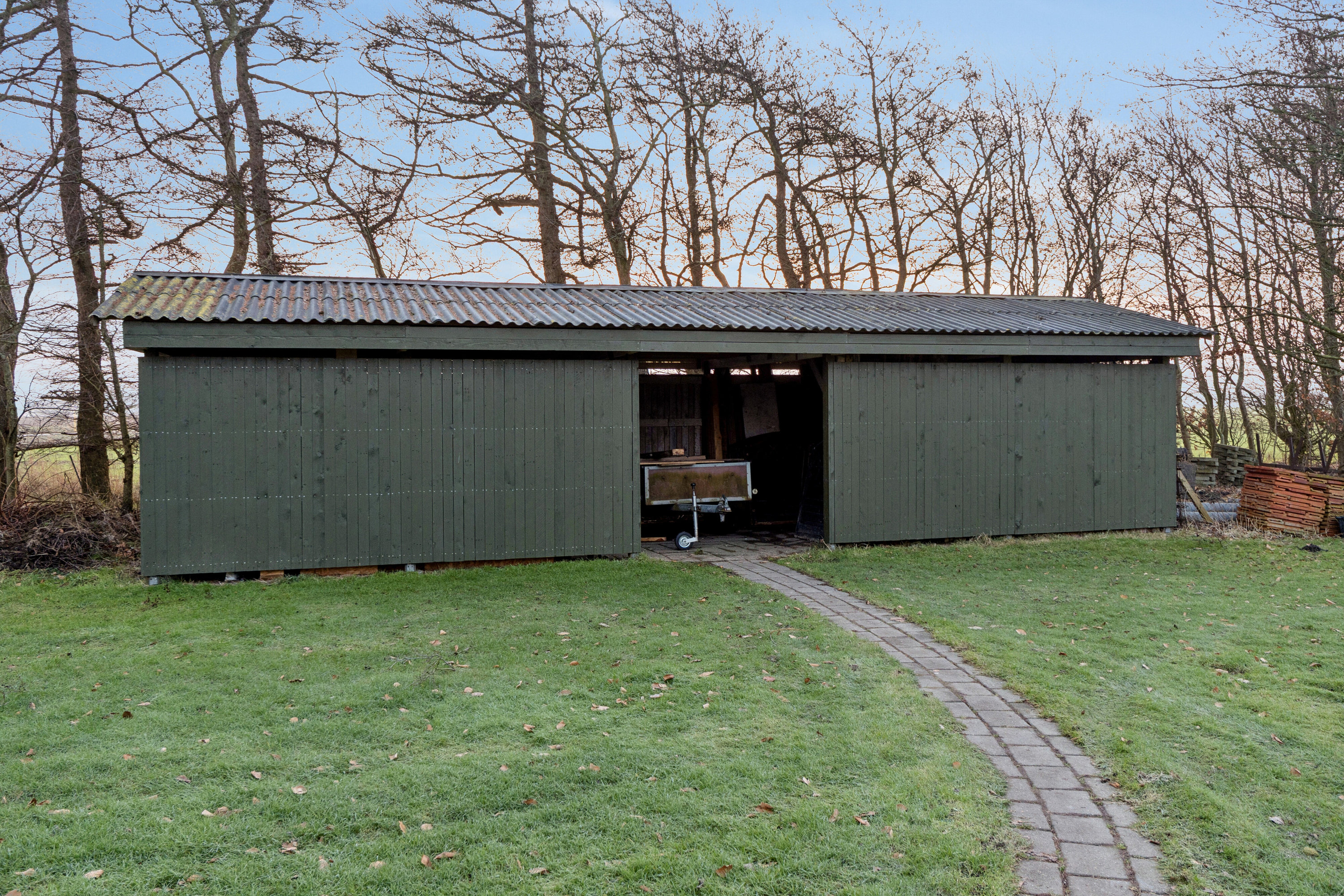 Fremhævet set fra haven billede i fuldskærmstilstand. Billede af Rønnovsholmvej 110, 9800 Hjørring