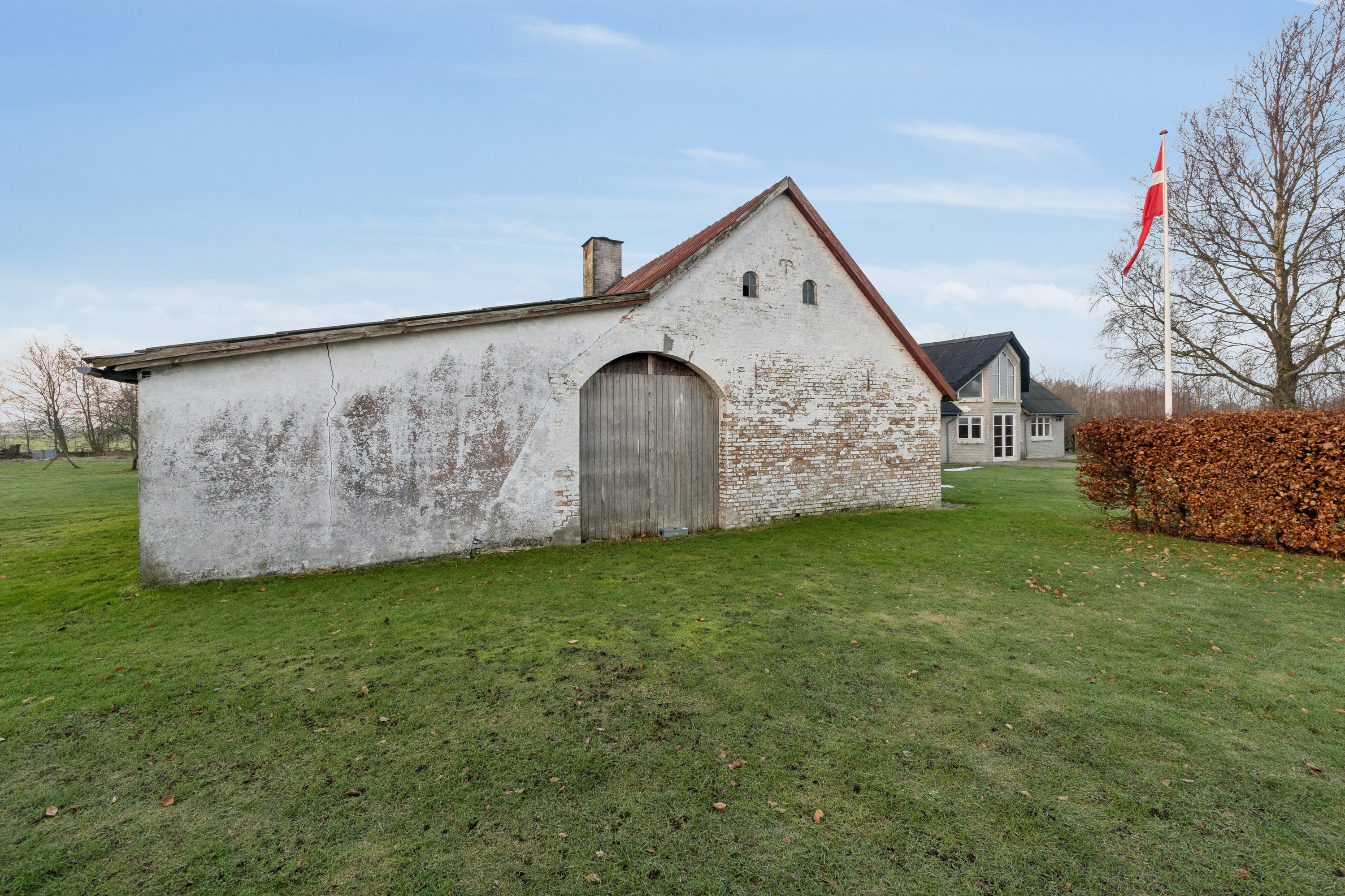 Fremhævet set fra haven billede i fuldskærmstilstand. Billede af Rønnovsholmvej 110, 9800 Hjørring