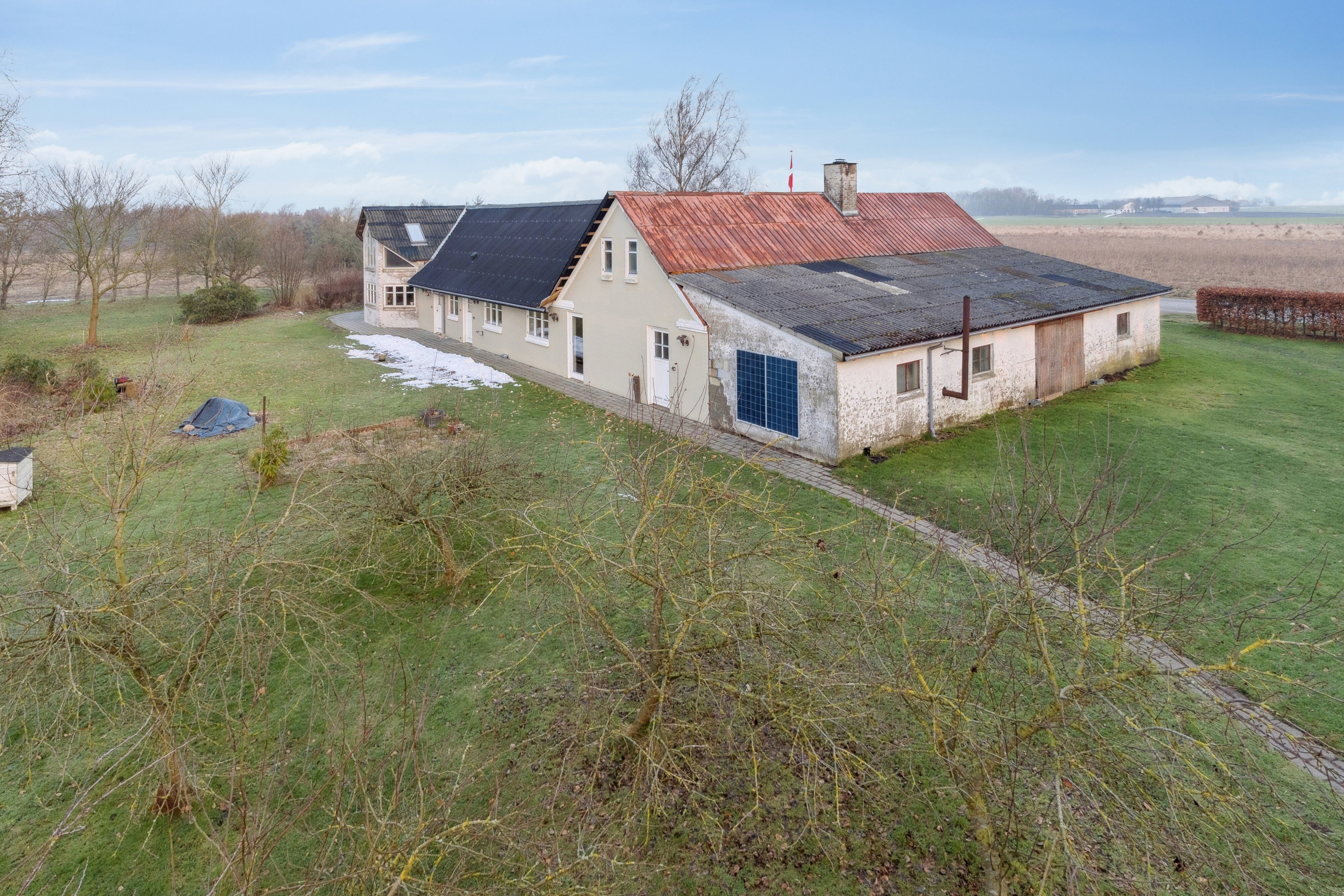 Fremhævet set fra haven billede i fuldskærmstilstand. Billede af Rønnovsholmvej 110, 9800 Hjørring