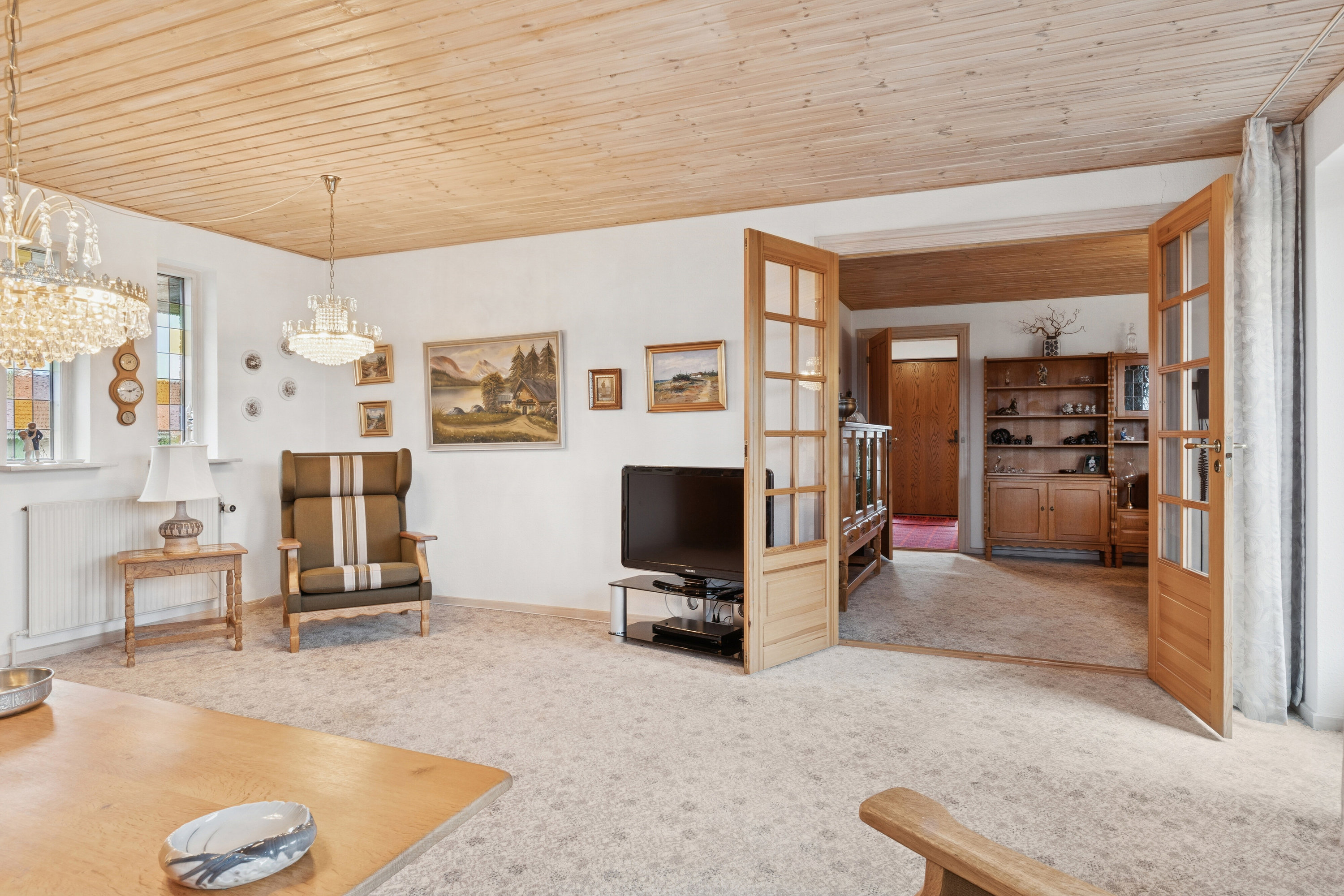 Fremhævet stue billede i fuldskærmstilstand. Billede af Nordvangen 4, 9870 Sindal