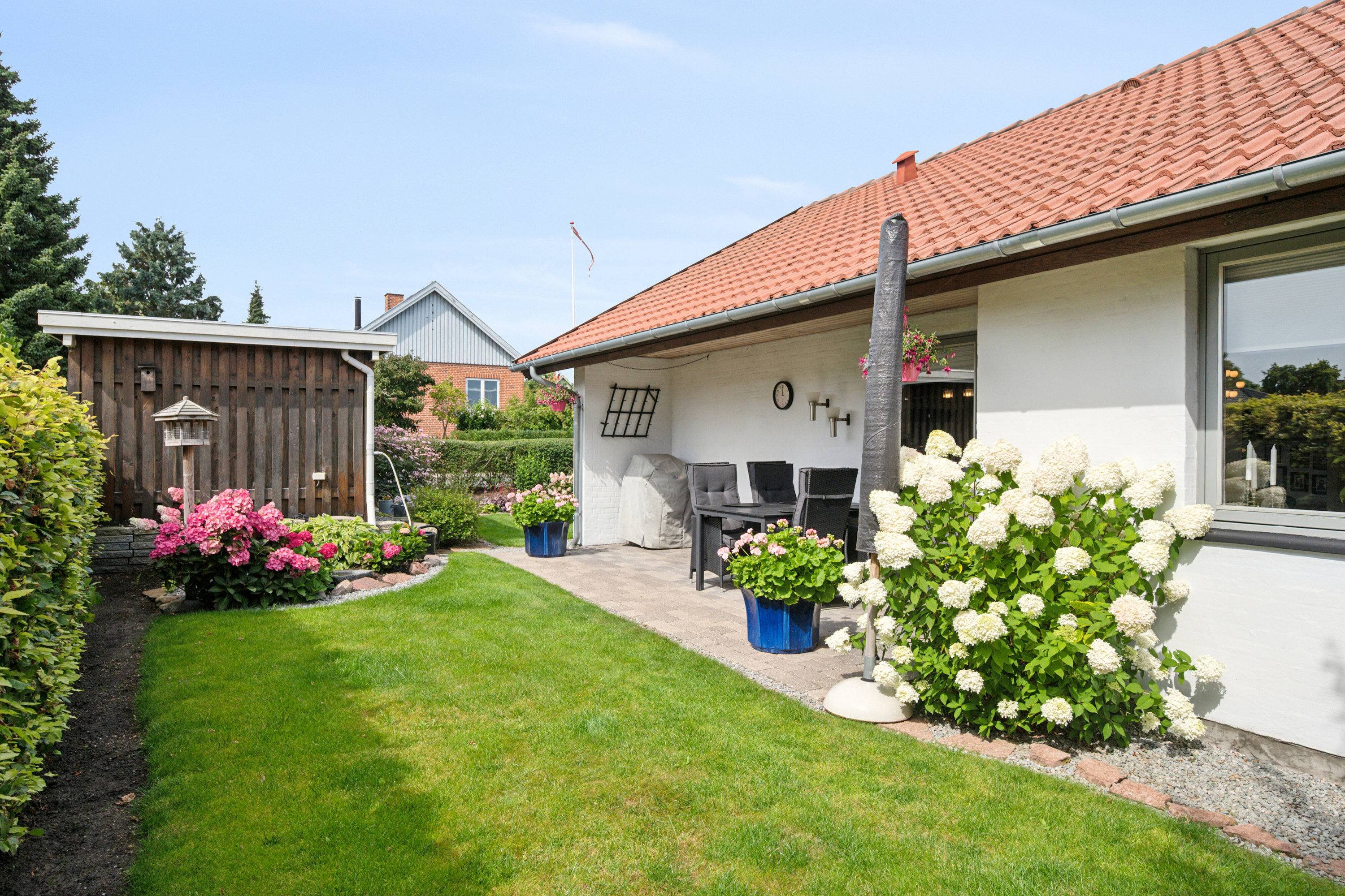 Fremhævet set fra haven billede i fuldskærmstilstand. Billede af Løgumvej 23B, 2610 Rødovre