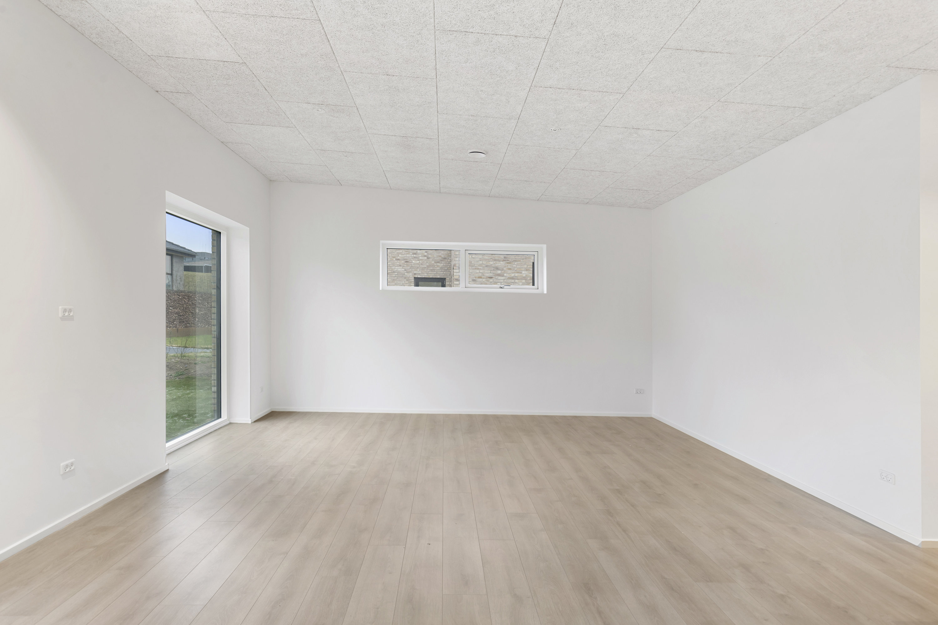 Fremhævet stue billede i fuldskærmstilstand. Billede af Gyvellunden 25, 9600 Aars