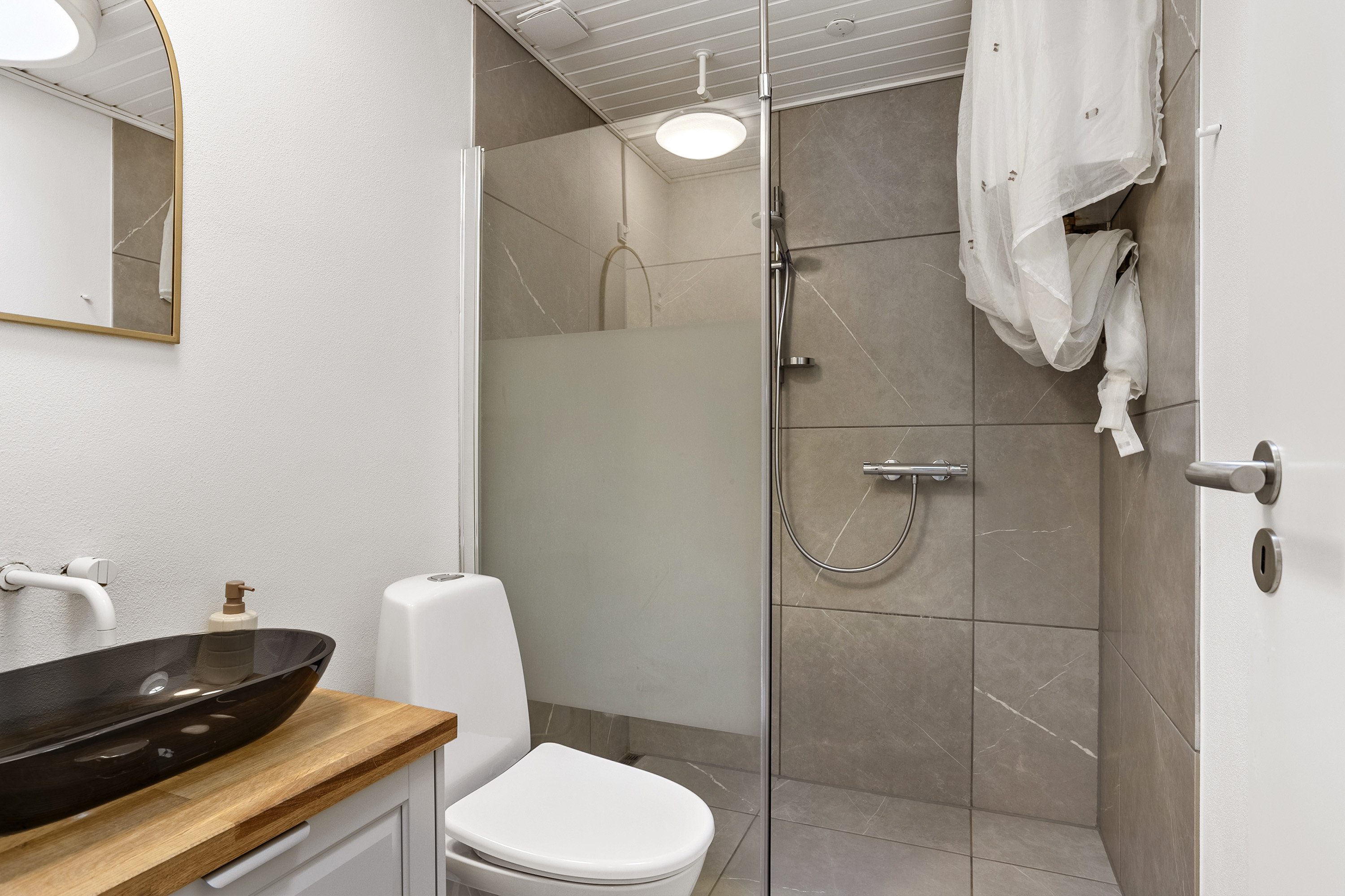 Fremhævet badeværelse billede i fuldskærmstilstand. Billede af Hejsager Strandby 71, 6100 Haderslev