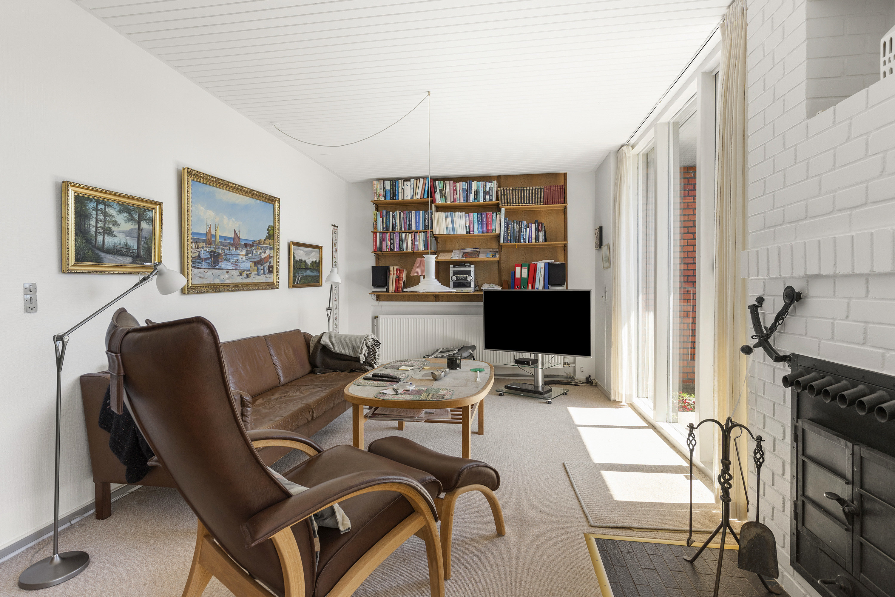 Fremhævet stue billede i fuldskærmstilstand. Billede af Gl Tingvej 27, 9600 Aars