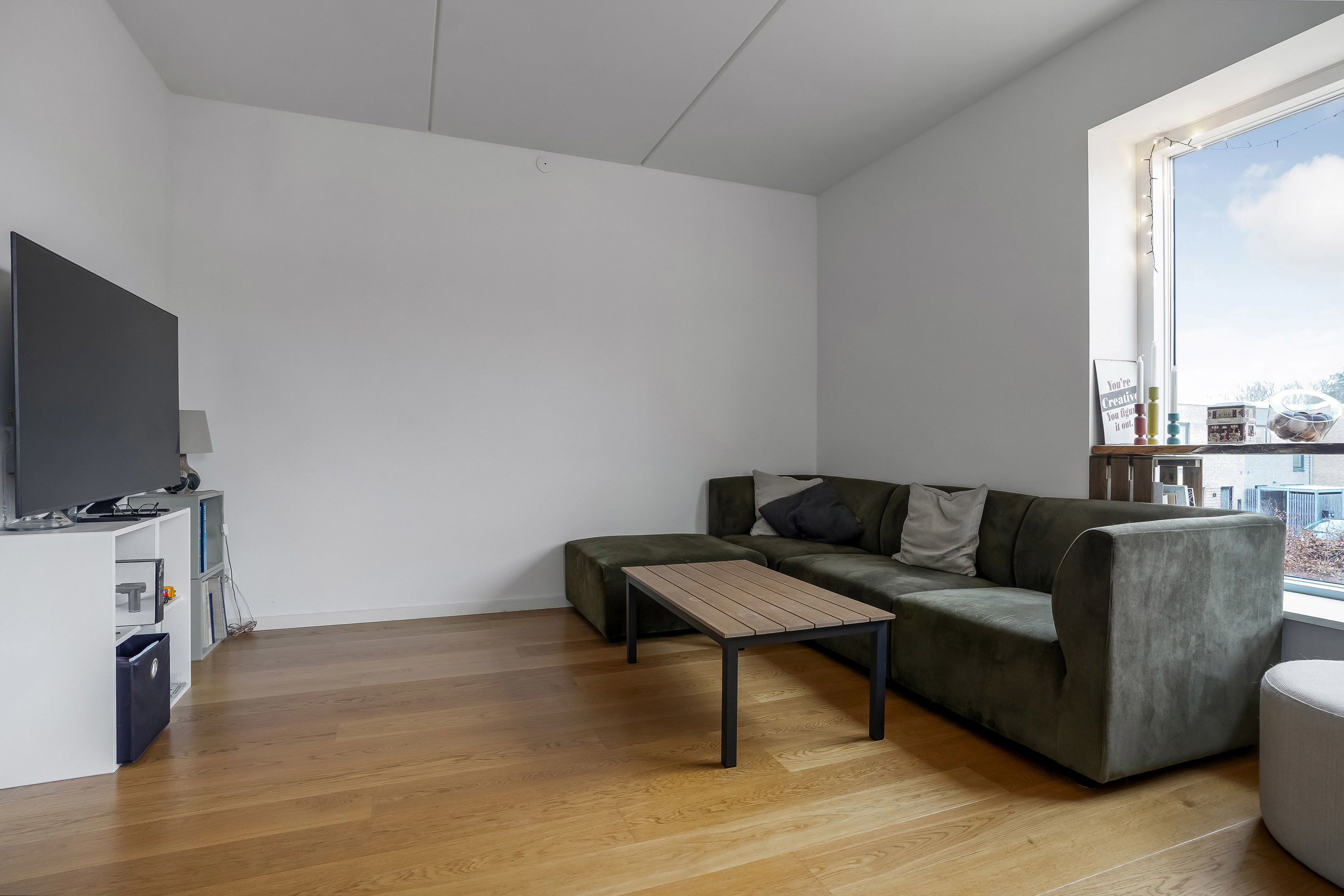 Fremhævet stue billede i fuldskærmstilstand. Billede af Guldrankevej 21, 1. 2., 5200 Odense V