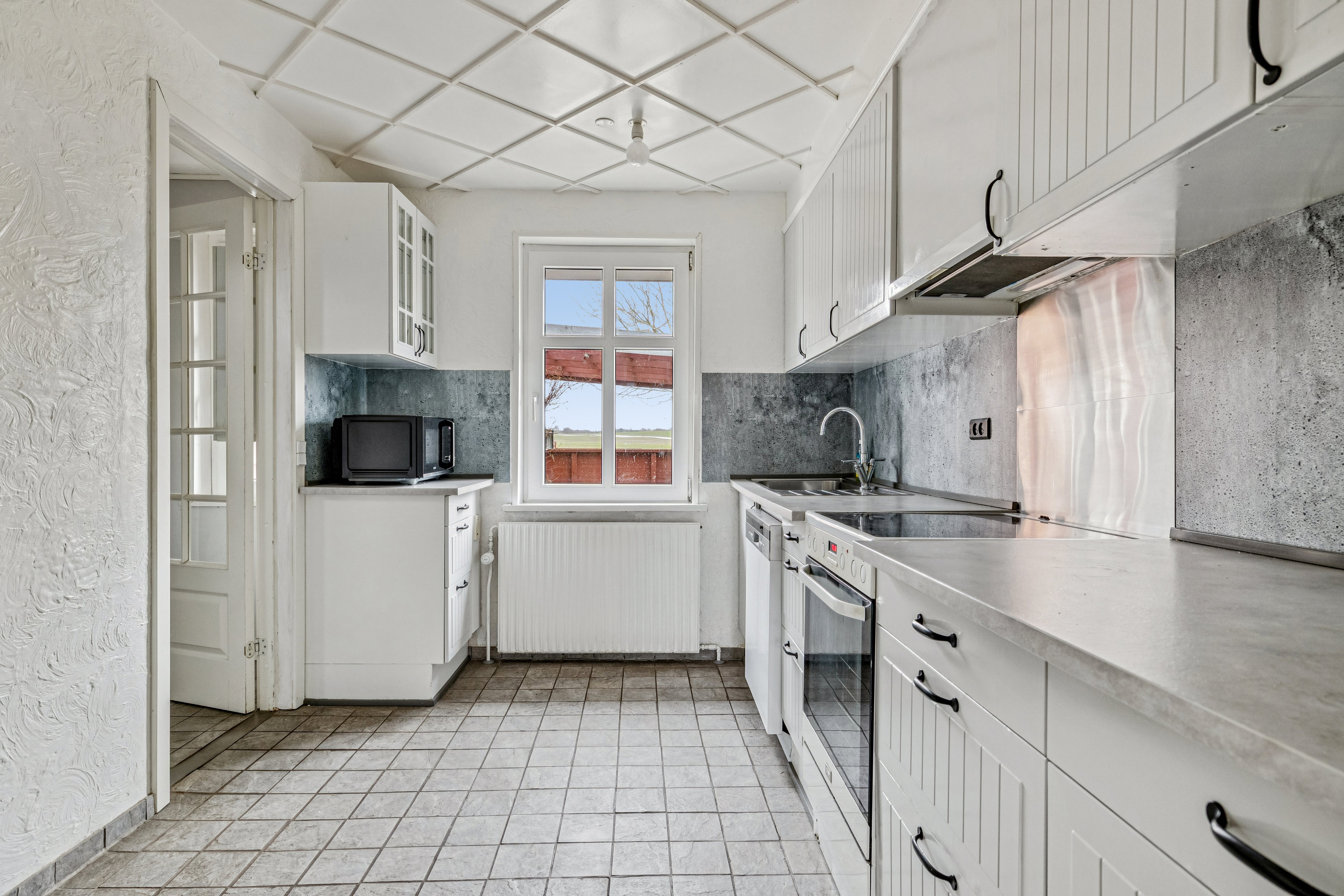 Fremhævet køkken billede i fuldskærmstilstand. Billede af Vidkærvej 14, Nørre Vissing, 8660 Skanderborg