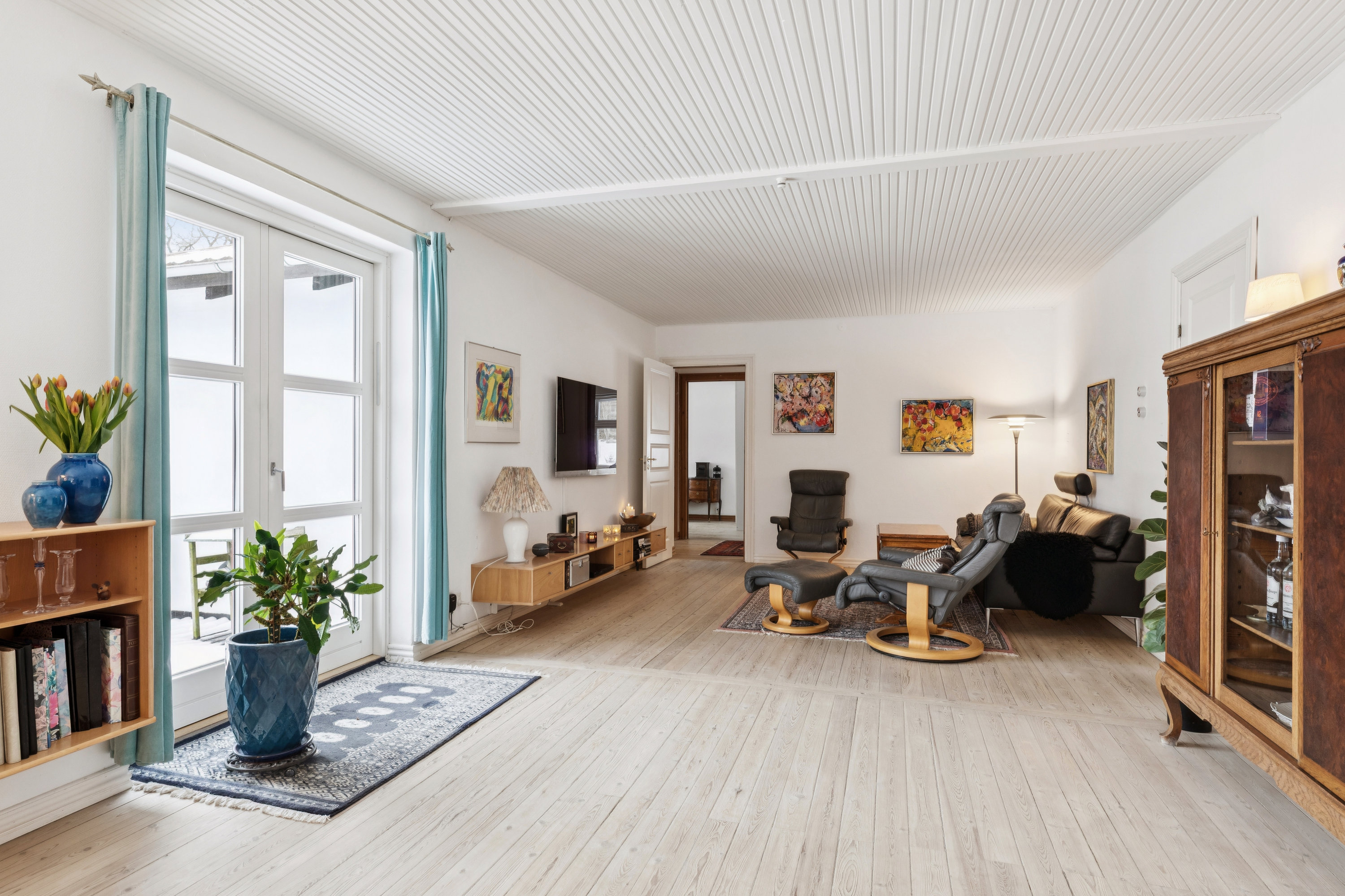 Fremhævet stue billede i fuldskærmstilstand. Billede af Snubbekorsvej 13, Vridsløsemagle, 2630 Taastrup