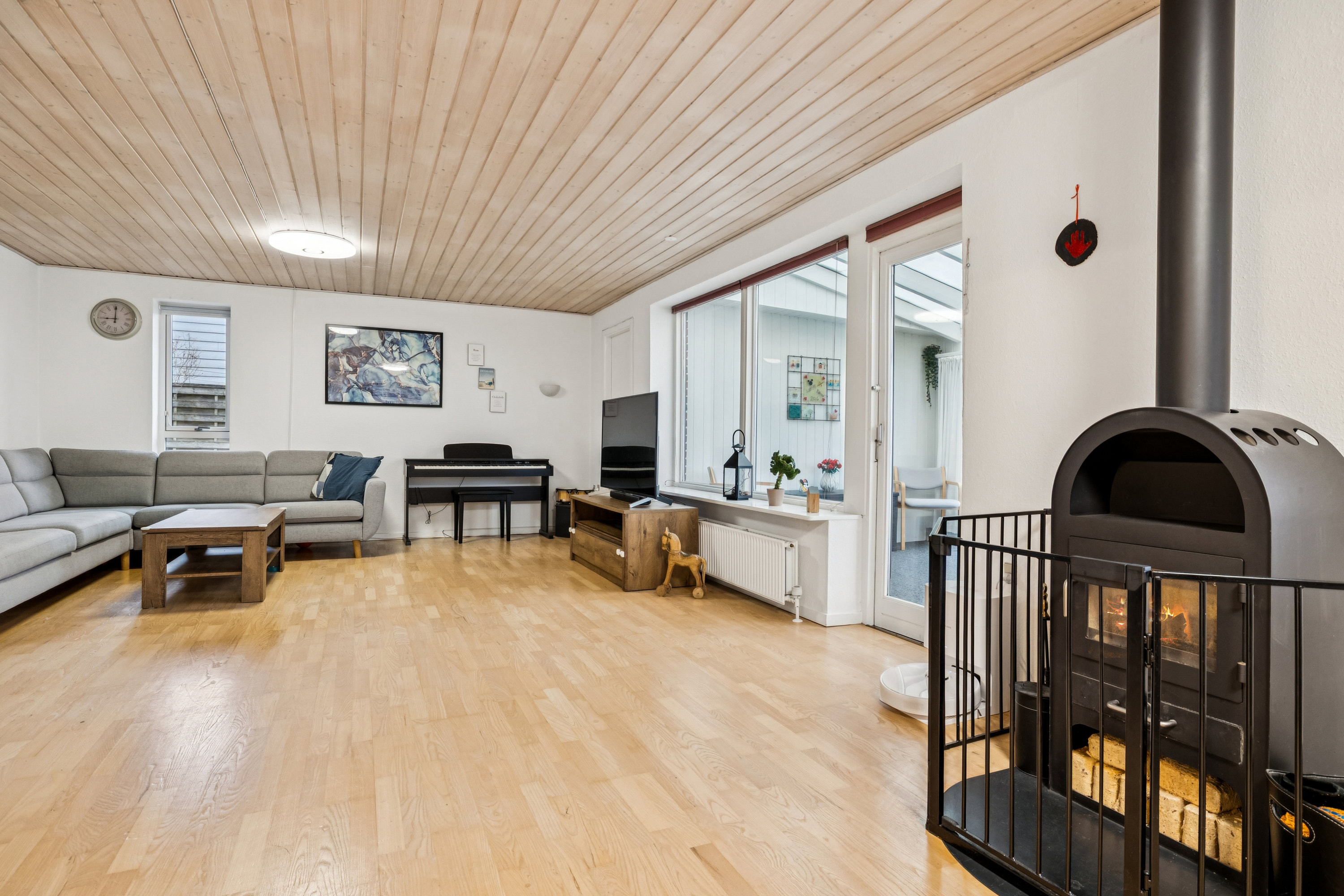 Fremhævet stue billede i fuldskærmstilstand. Billede af Tyttebærvej 26, 8850 Bjerringbro