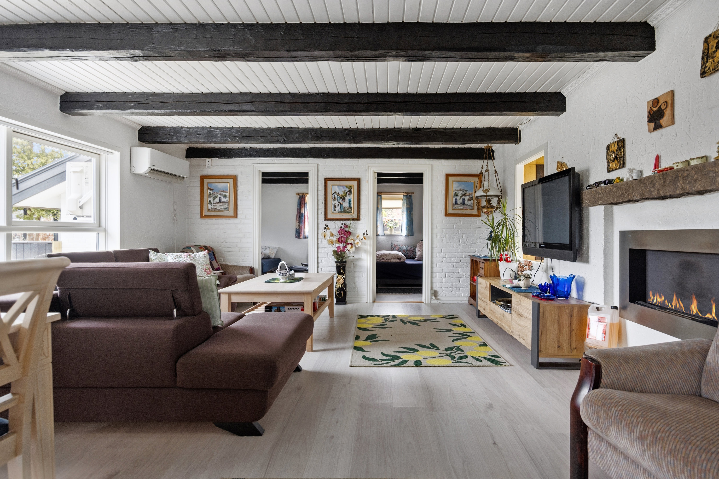 Fremhævet stue billede i fuldskærmstilstand. Billede af Knudshoved 10, 9370 Hals