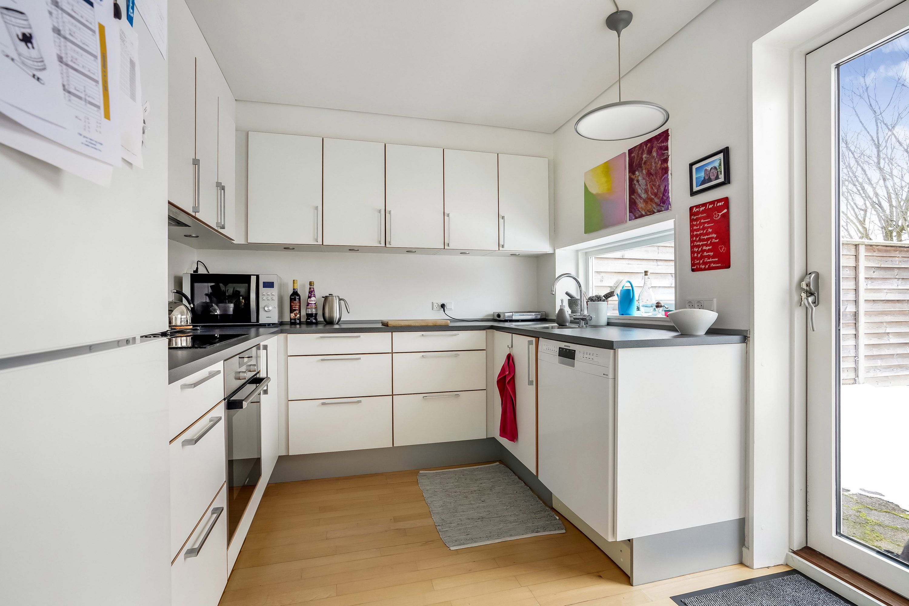 Fremhævet køkken billede i fuldskærmstilstand. Billede af Neder-Holluf-Vej 30L, 5220 Odense SØ