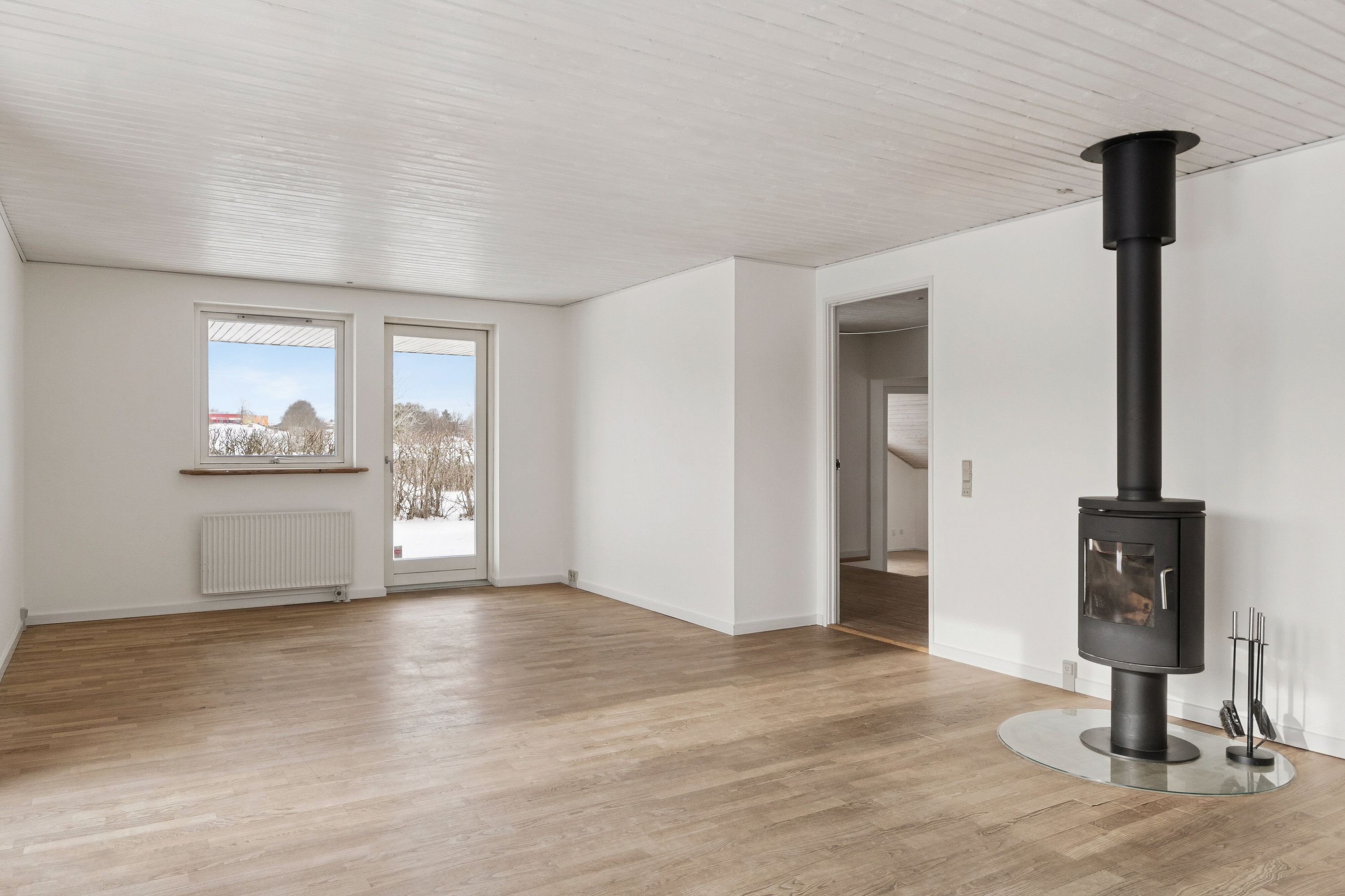 Fremhævet stue billede i fuldskærmstilstand. Billede af Rugvænget 33, 9870 Sindal