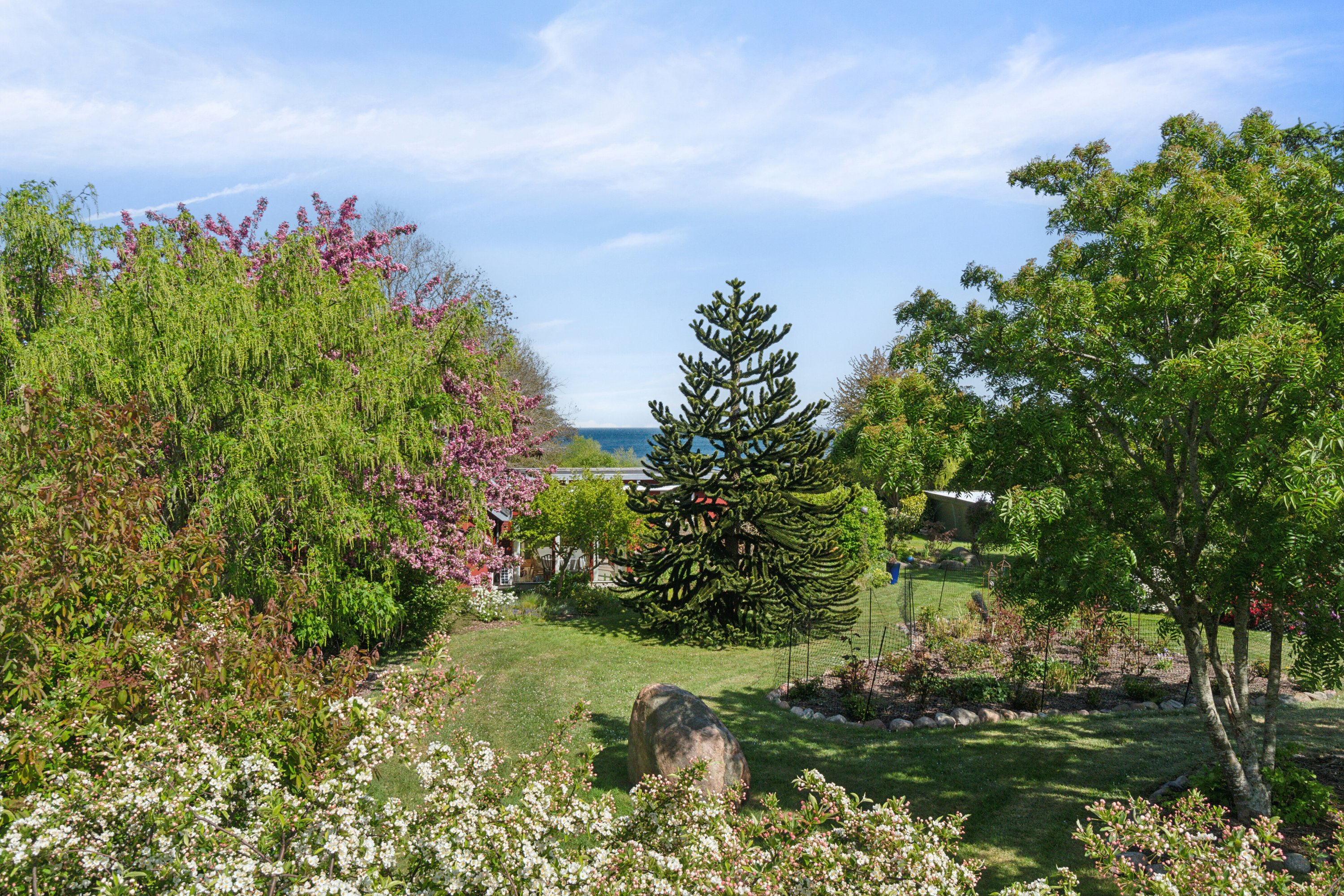 Fremhævet udendørs billede i fuldskærmstilstand. Billede af Aarsdalevej 38, 3740 Svaneke