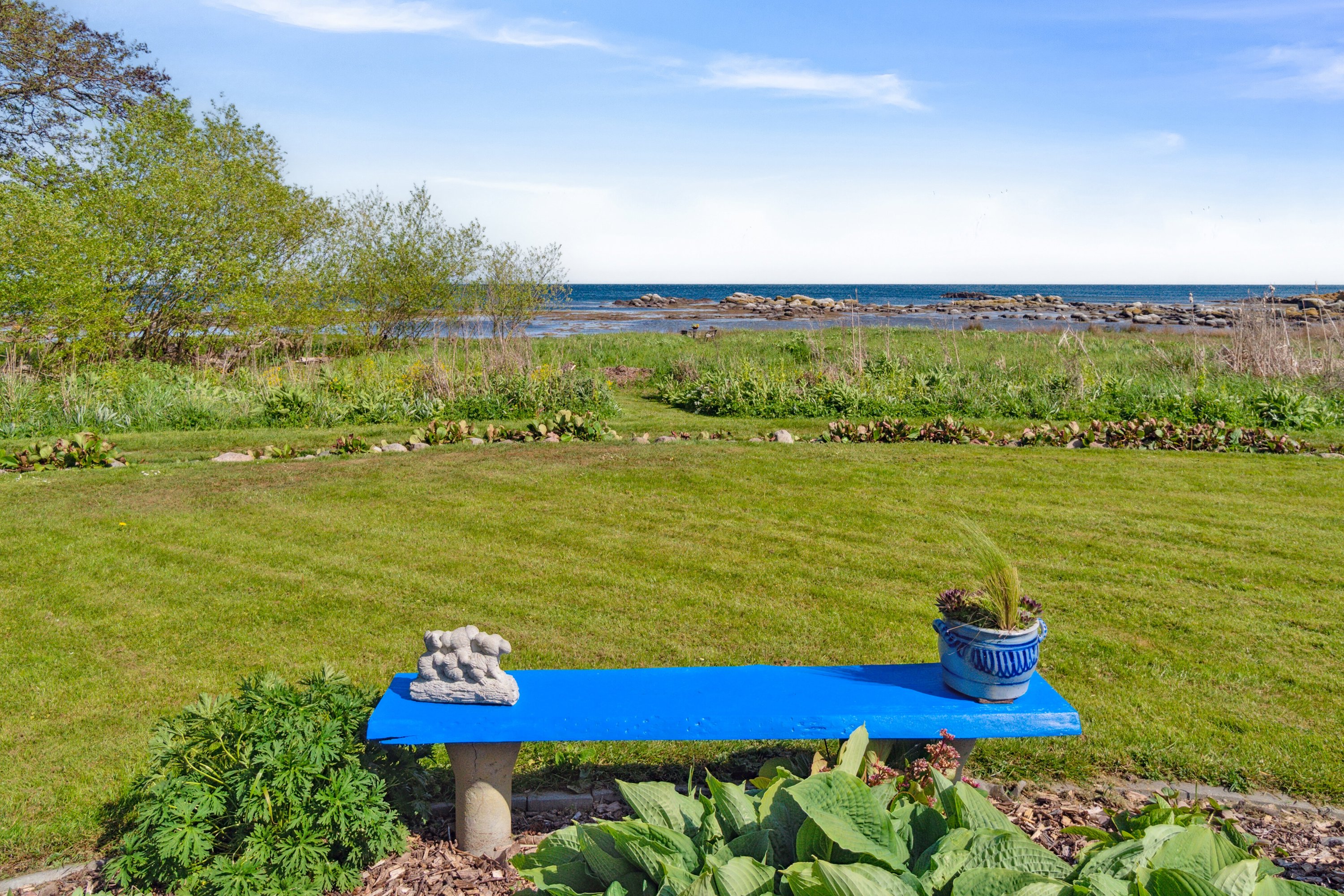 Fremhævet set fra haven billede i fuldskærmstilstand. Billede af Aarsdalevej 38, 3740 Svaneke